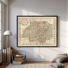 The image is a framed antique map of Europe, featuring detailed geographical information and various symbols and labels.