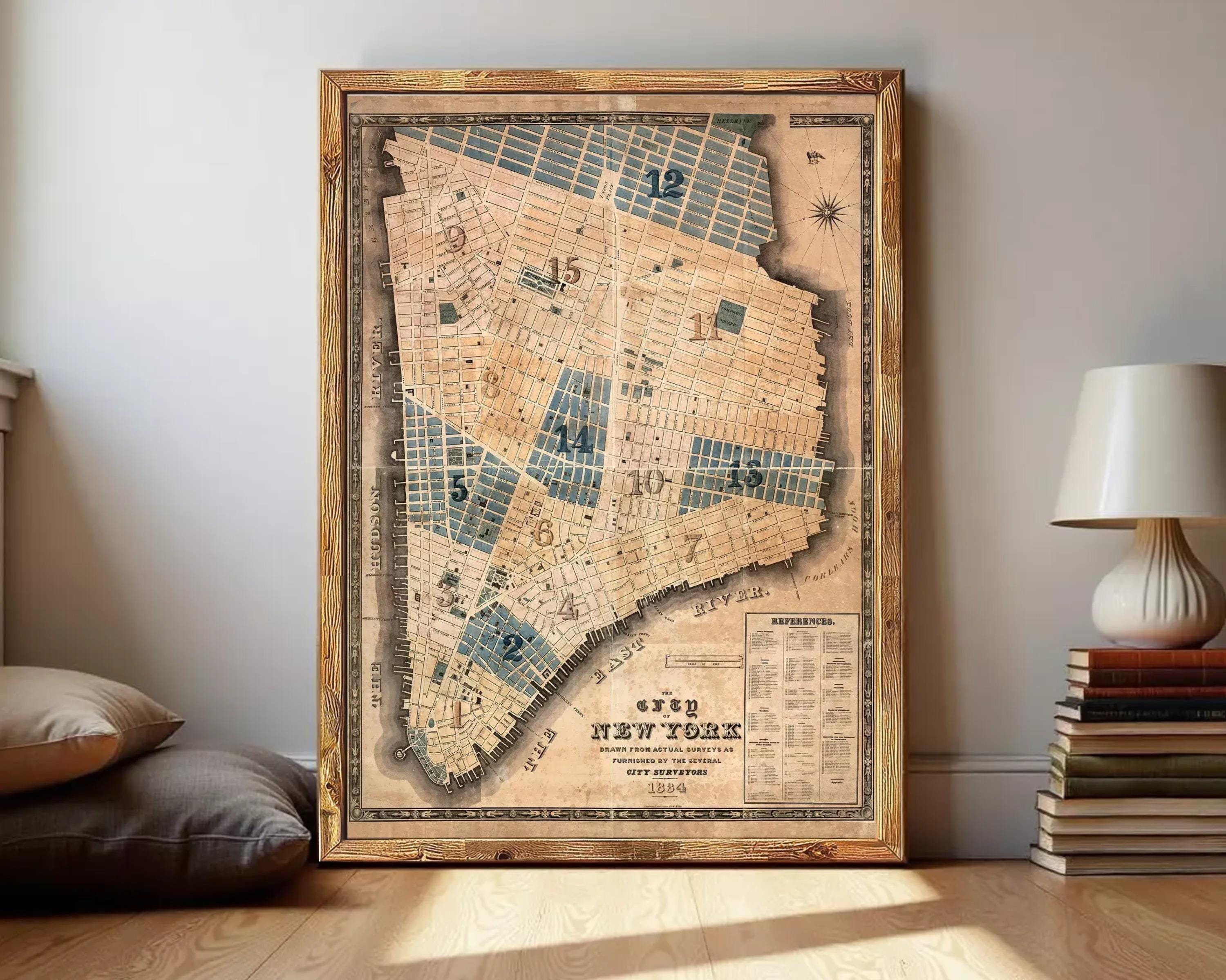 The image is a framed map of New York City, depicting the city's streets and neighborhoods.
