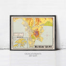 The image is a framed vintage map of Hong Kong, featuring a detailed and colorful depiction of the city's streets, landmarks, and surrounding areas.