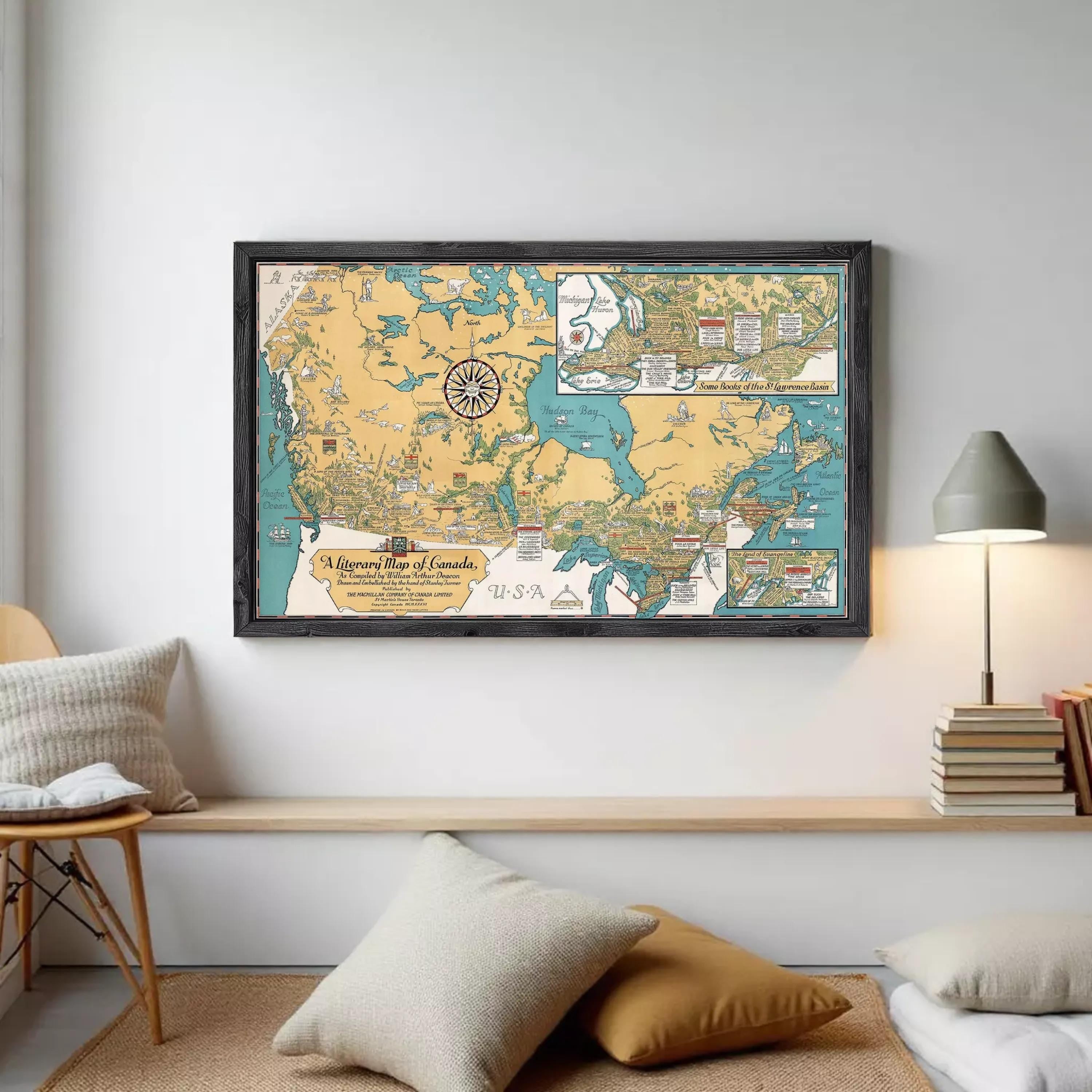 A framed map of Canada, depicting various regions and landmarks, is displayed on a white wall.