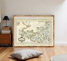 The image is a framed antique map of Europe, depicting the continent and surrounding areas in a detailed and intricate manner.