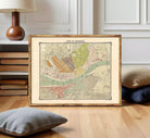 The image is a framed vintage map of Berlin, Germany, depicting the city's streets and landmarks.