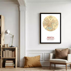 A framed vintage map of Perth, Australia, with the city's name and location prominently displayed.