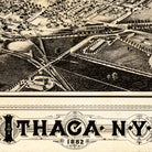 The image is a black and white illustration of a city, depicting a large field, buildings, and roads.