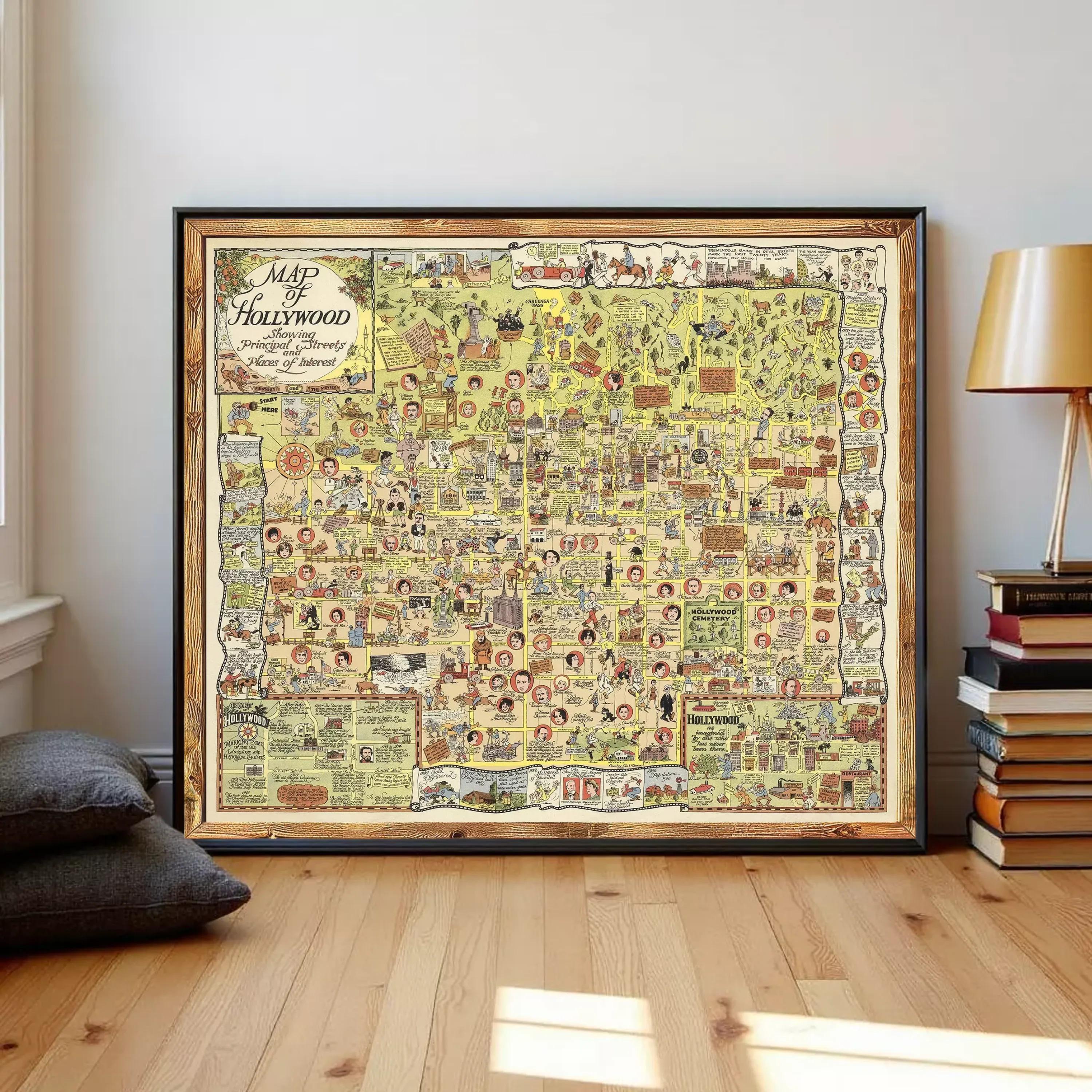 The image is a framed vintage map of Hollywood, California, depicting various landmarks, streets, and people in a detailed and colorful manner.
