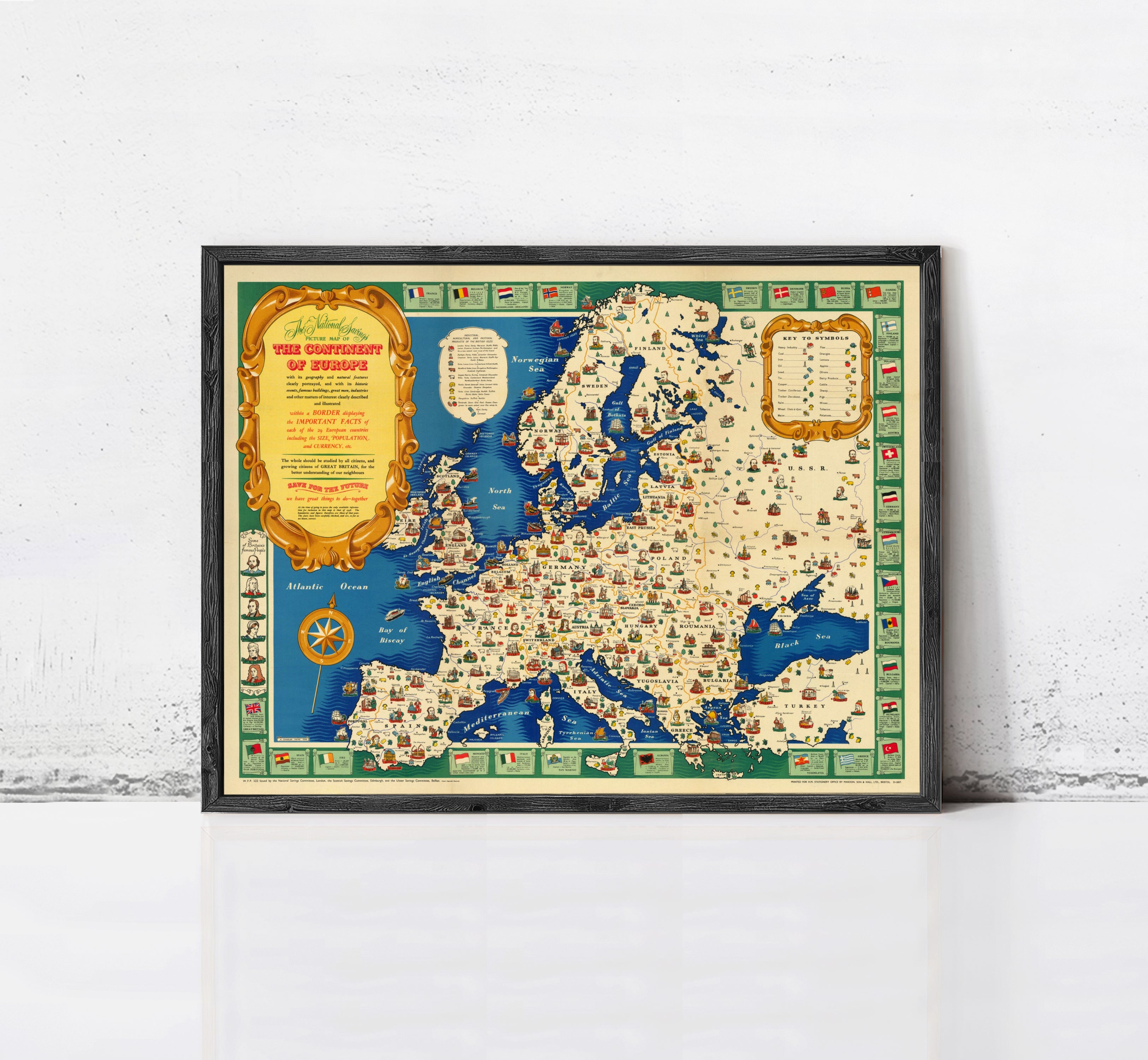 The image is a framed map of Europe, featuring various landmarks and countries across the continent.