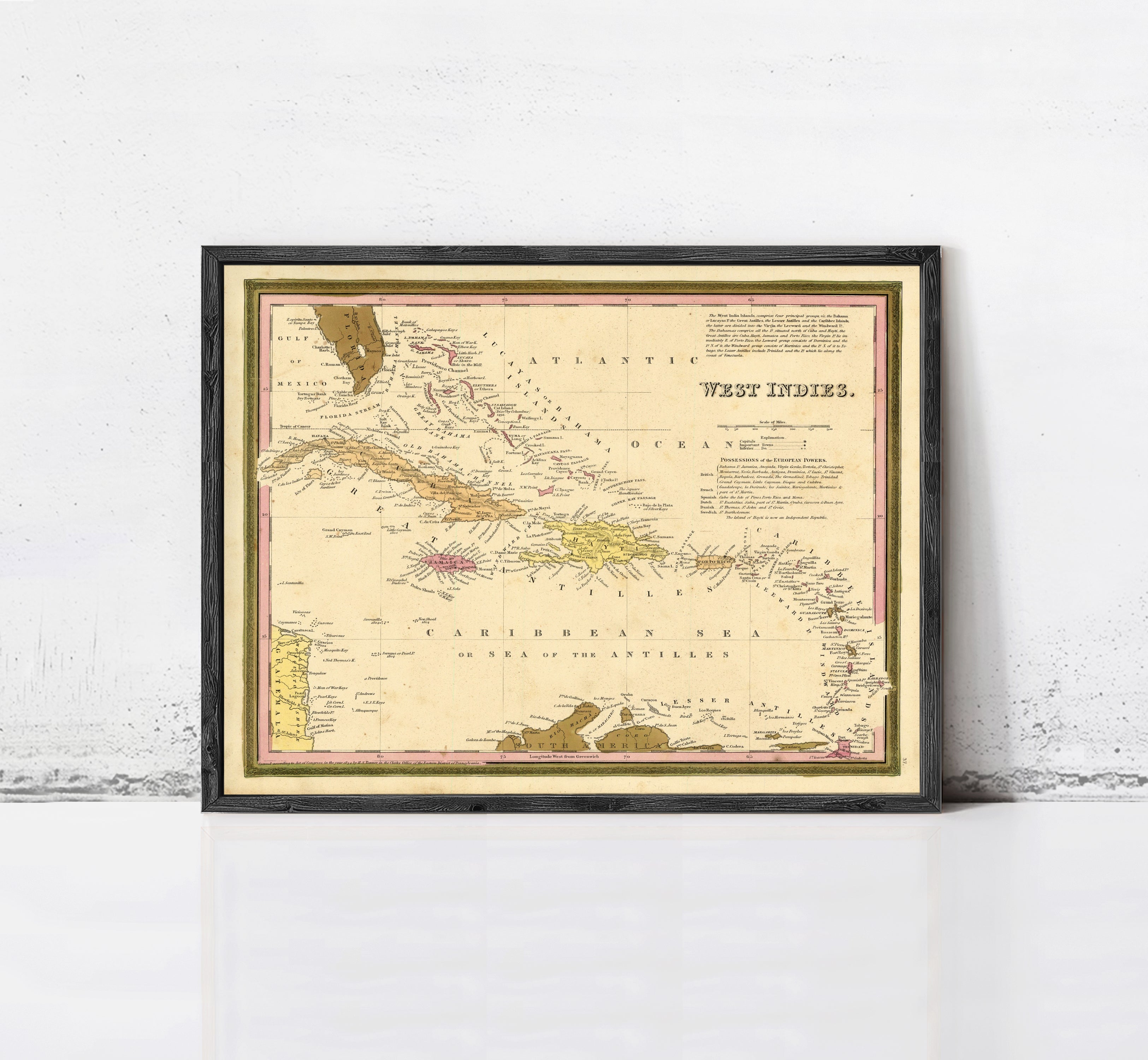 The image is a framed vintage map of West Indies, showing the Caribbean Sea and surrounding areas.