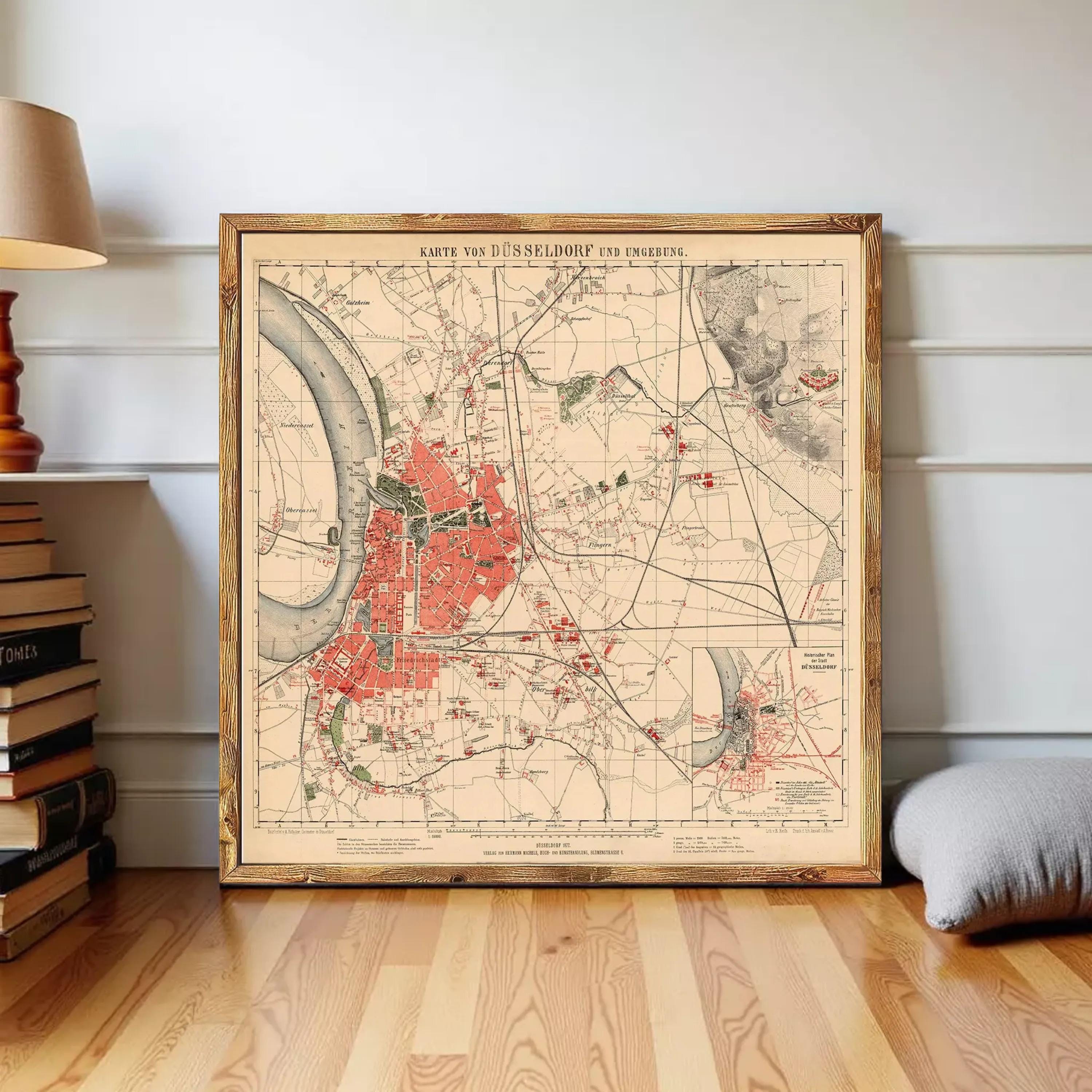 The image is a framed vintage map of Dusseldorf, Germany, depicting the city's layout and surrounding areas.