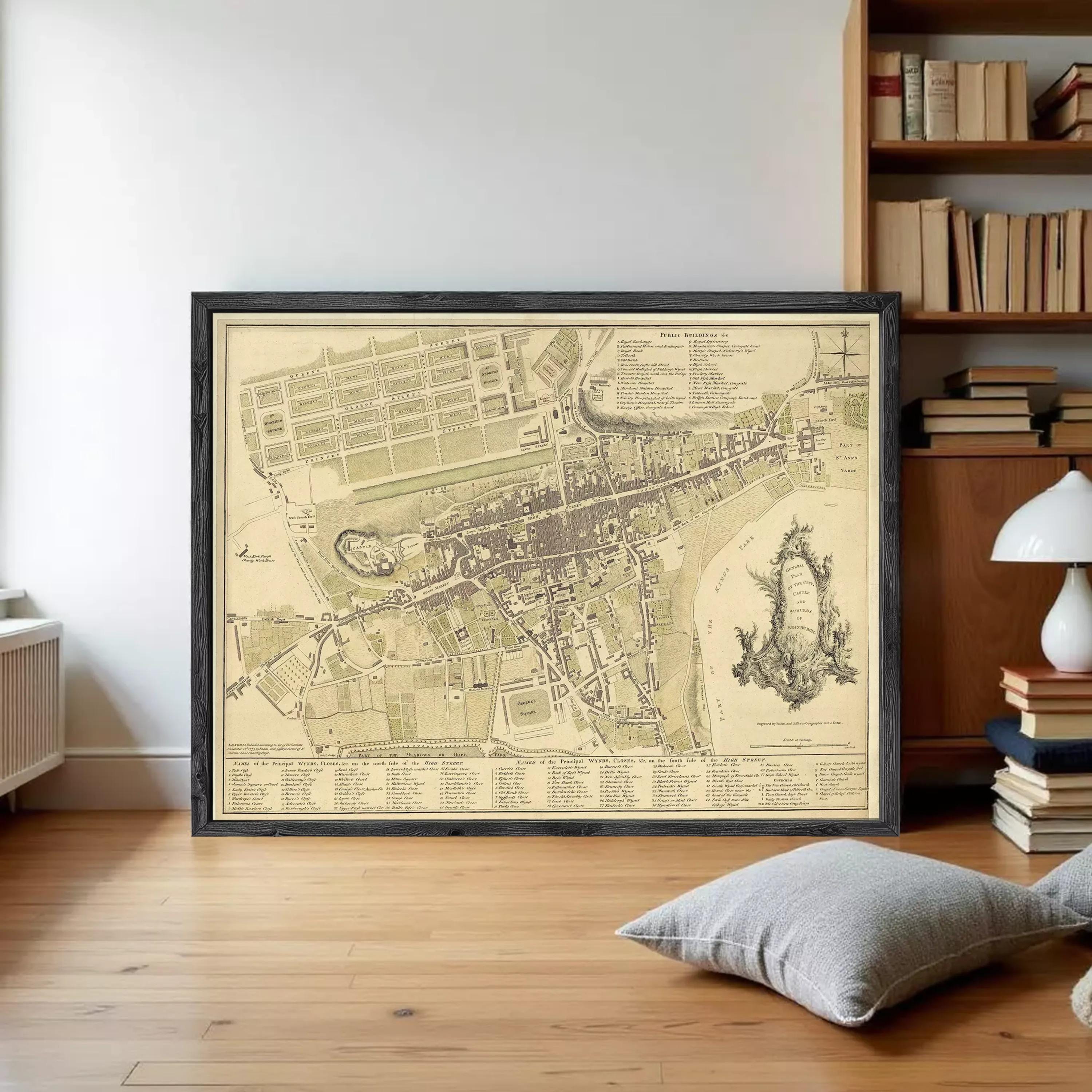The image is a framed vintage map of a city, depicting a detailed layout of streets, buildings, and other urban features.