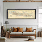 A framed map of Madagascar, a country in the South Pacific, is displayed against a white wall.