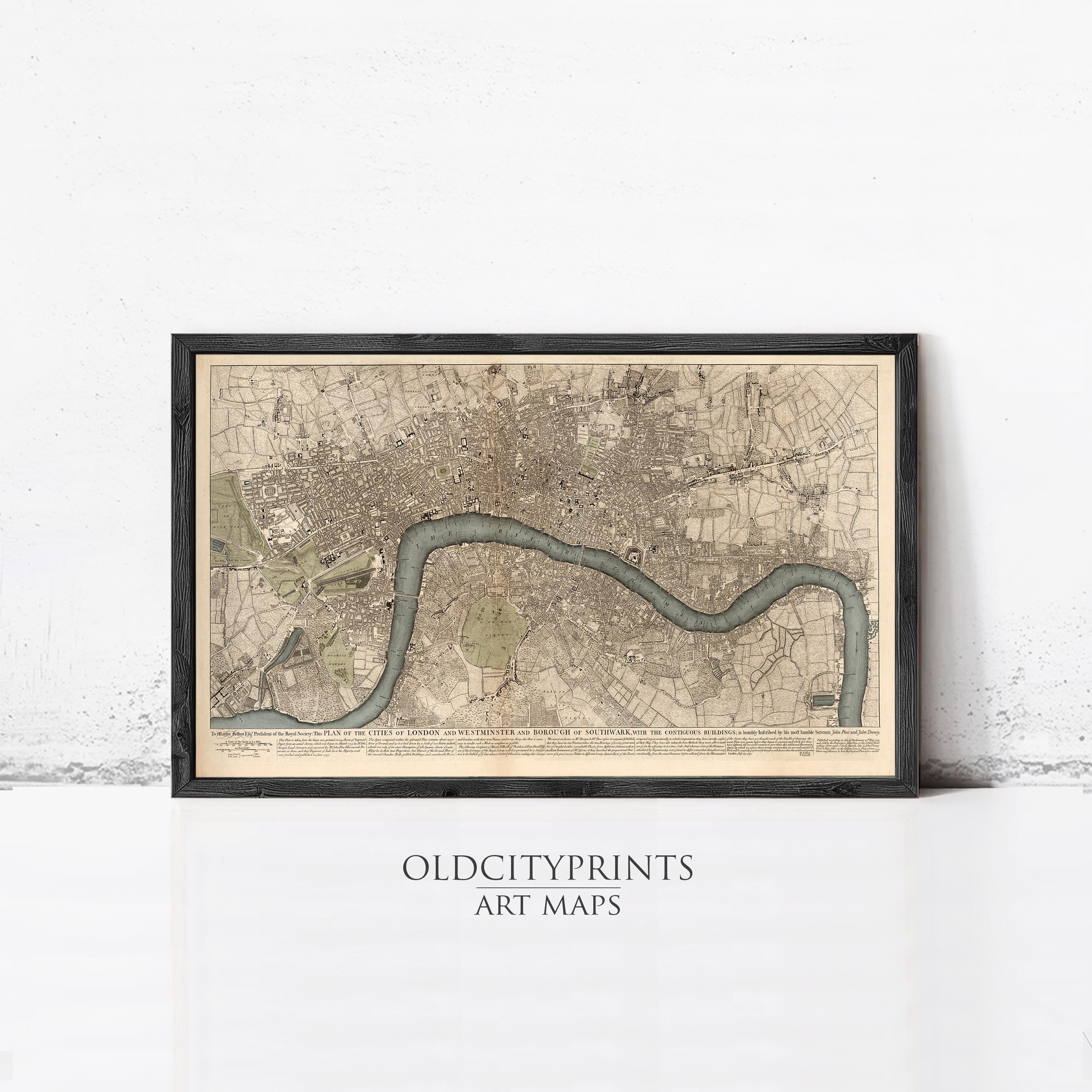 The image is a framed art print depicting a map of London, England, with a river running through the city.