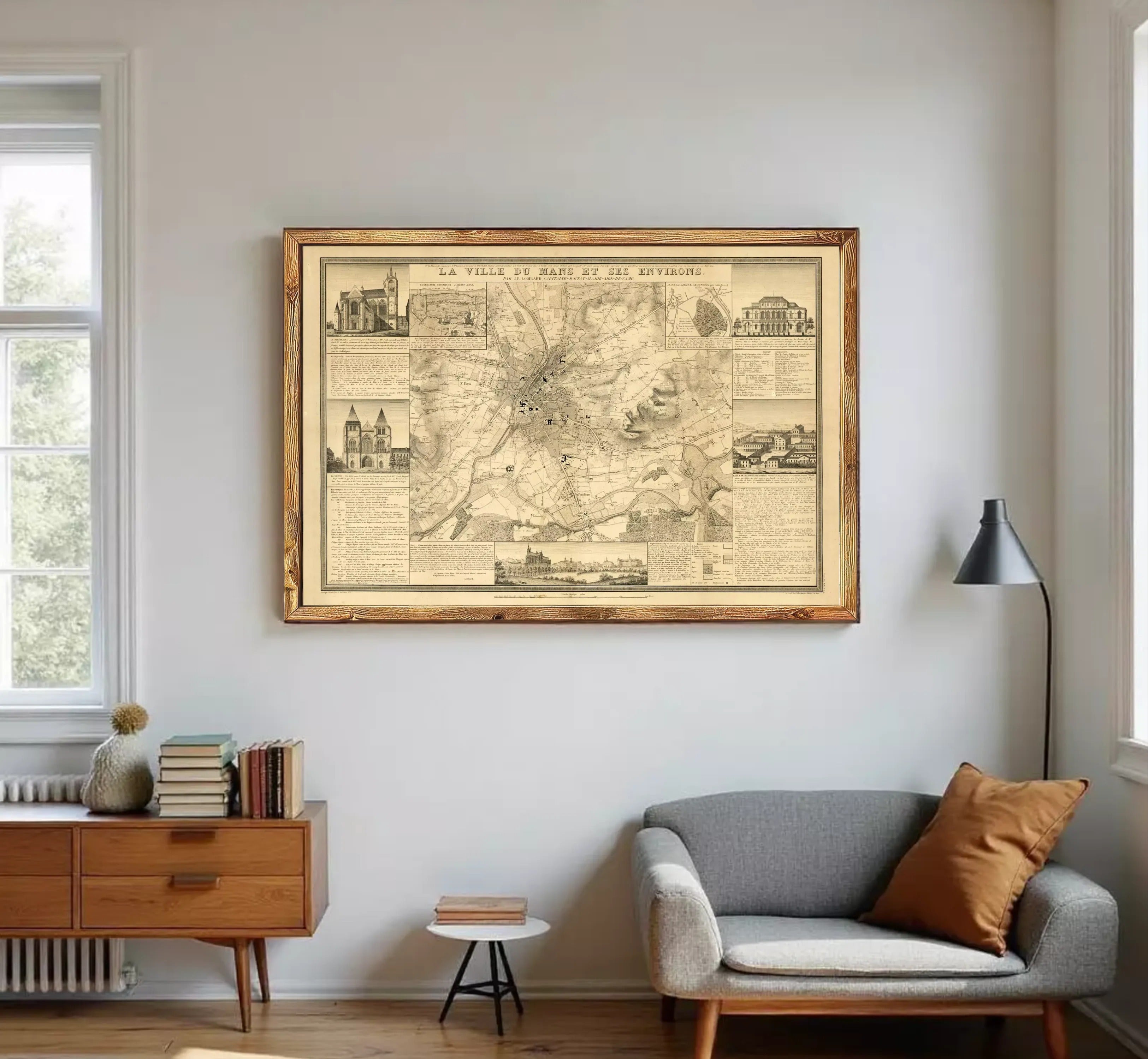 The image is a framed vintage map of a city, likely Paris, with various landmarks and streets depicted.