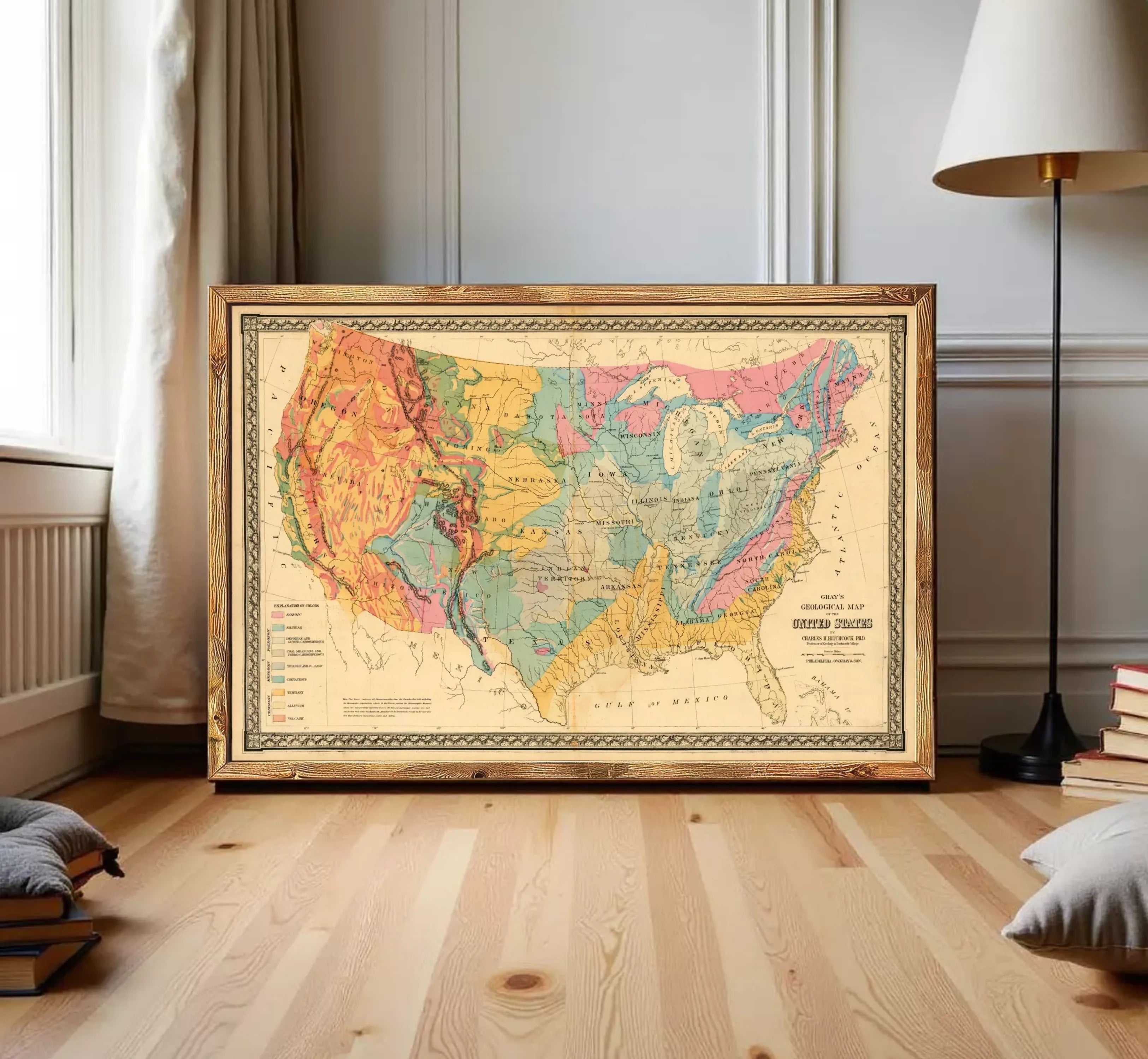 The image is a framed vintage geological map of the United States, depicting the various geological features and regions of the country.