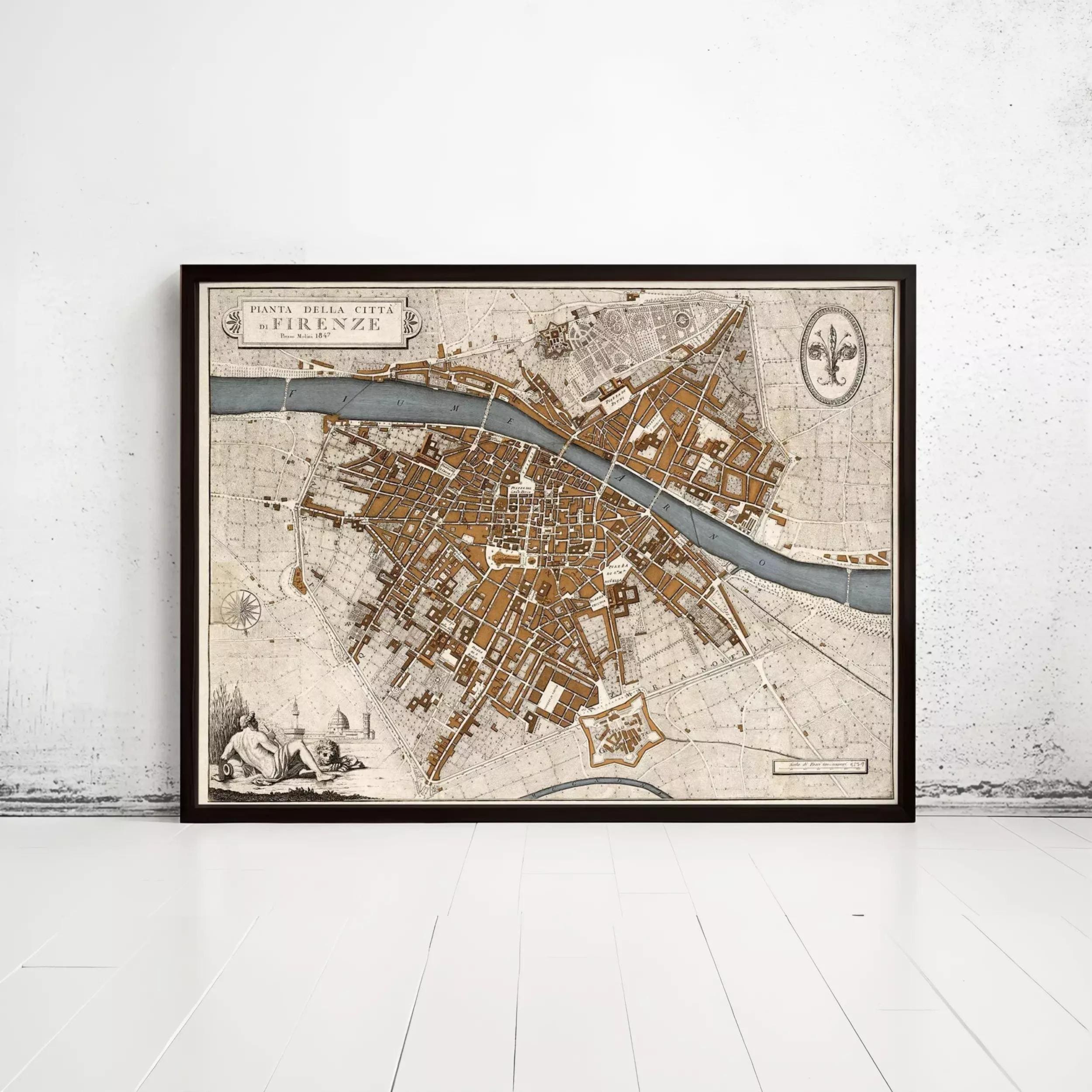 A framed map of Florence, Italy, depicting the city's layout and surrounding areas.