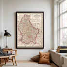 The image is a framed map of Luxembourg, showing the country's roads and surrounding areas.