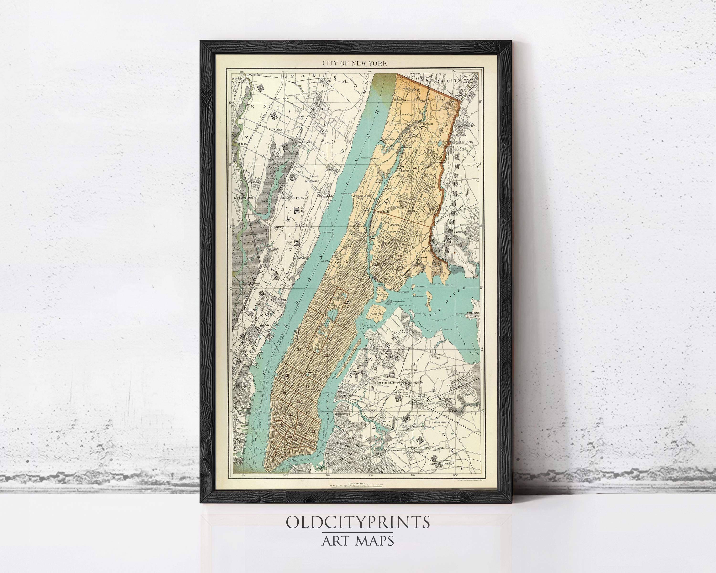 The image is a framed vintage map of New York City, depicting the city's streets, neighborhoods, and surrounding areas.