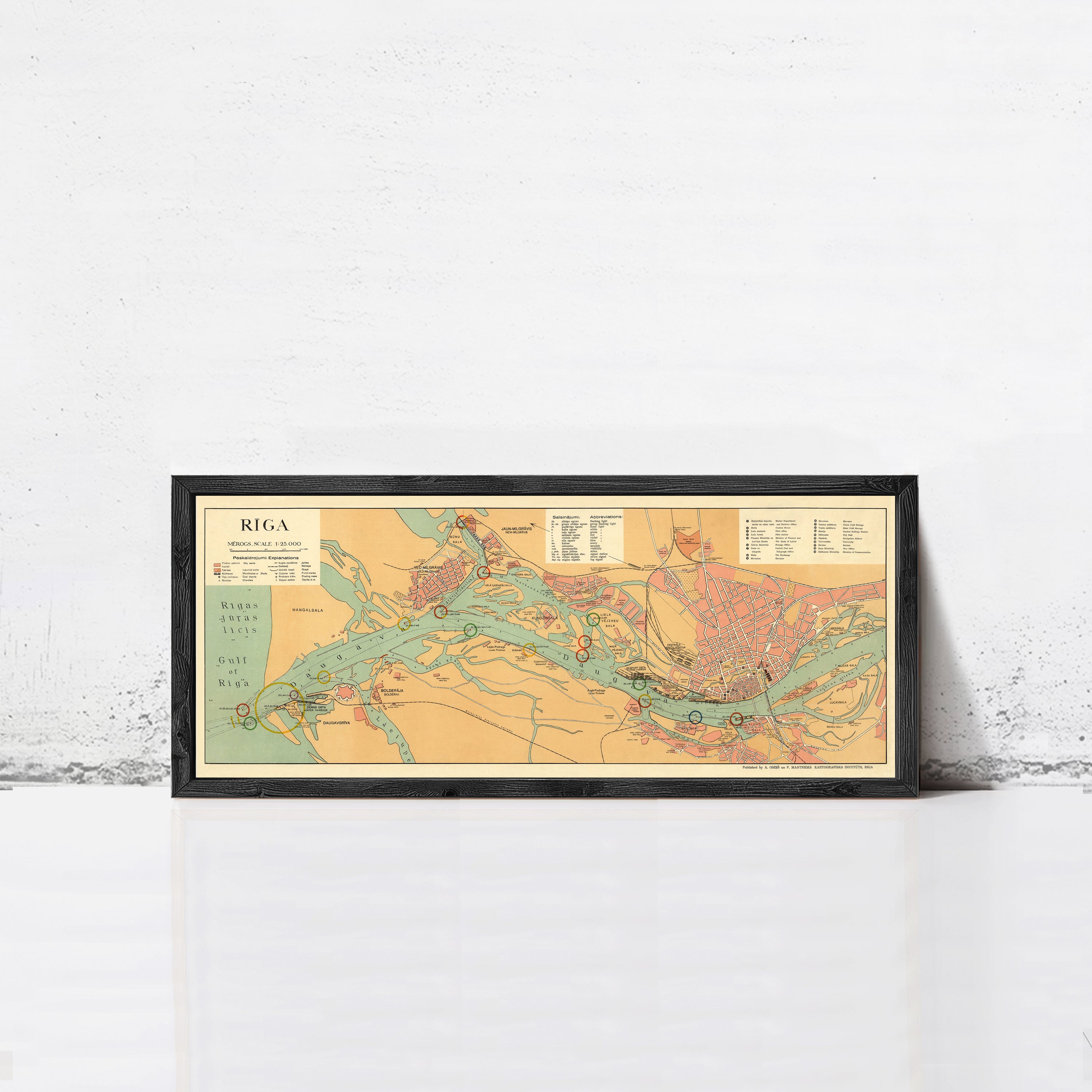 A framed map of the island of Riga, showing the geographical layout and surrounding areas.