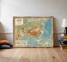 The image is a framed vintage map of Asia, depicting the countries and major geographical features of the region.
