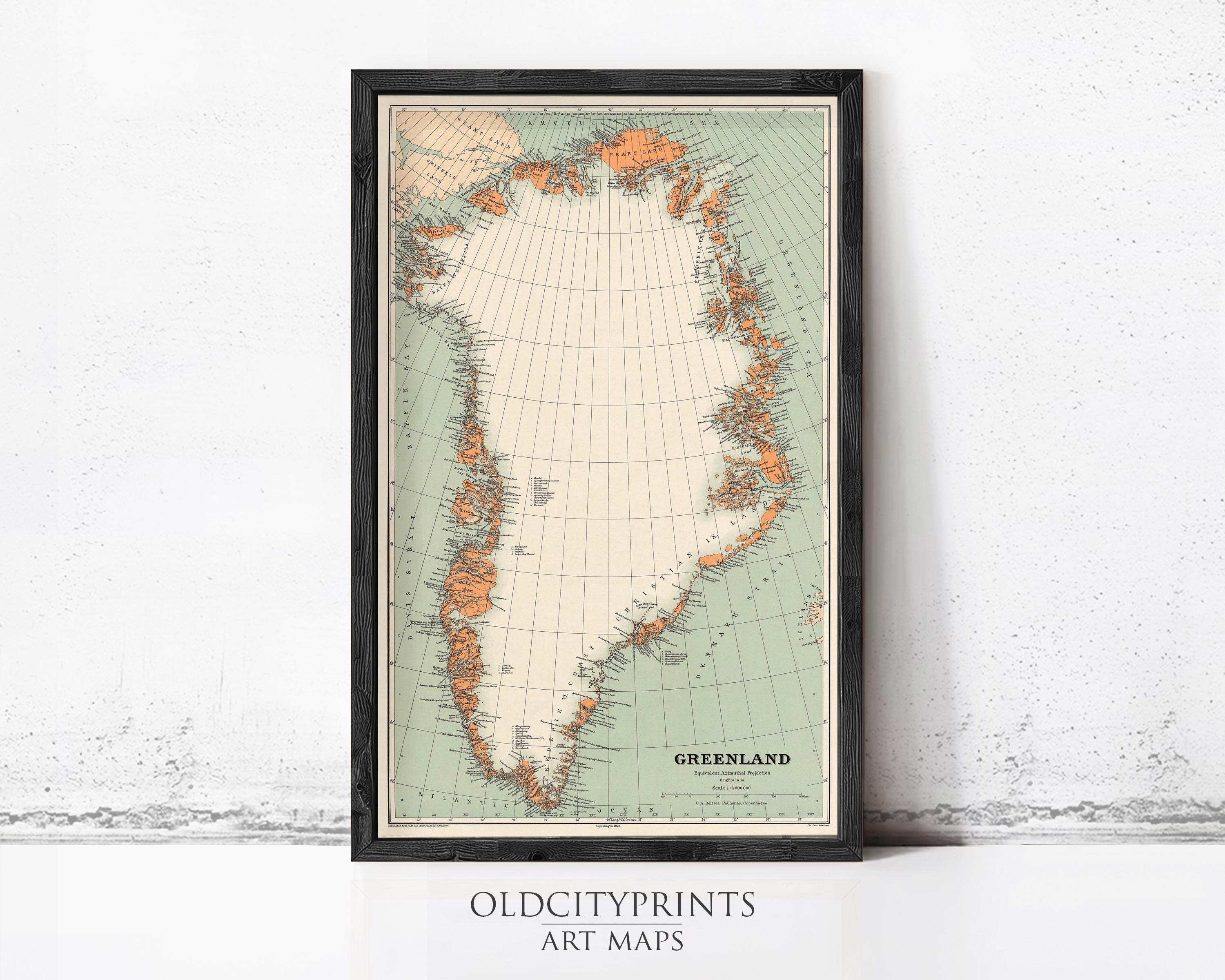 The image is a framed vintage map of Greenland, depicting the country's geographical layout and surrounding areas.