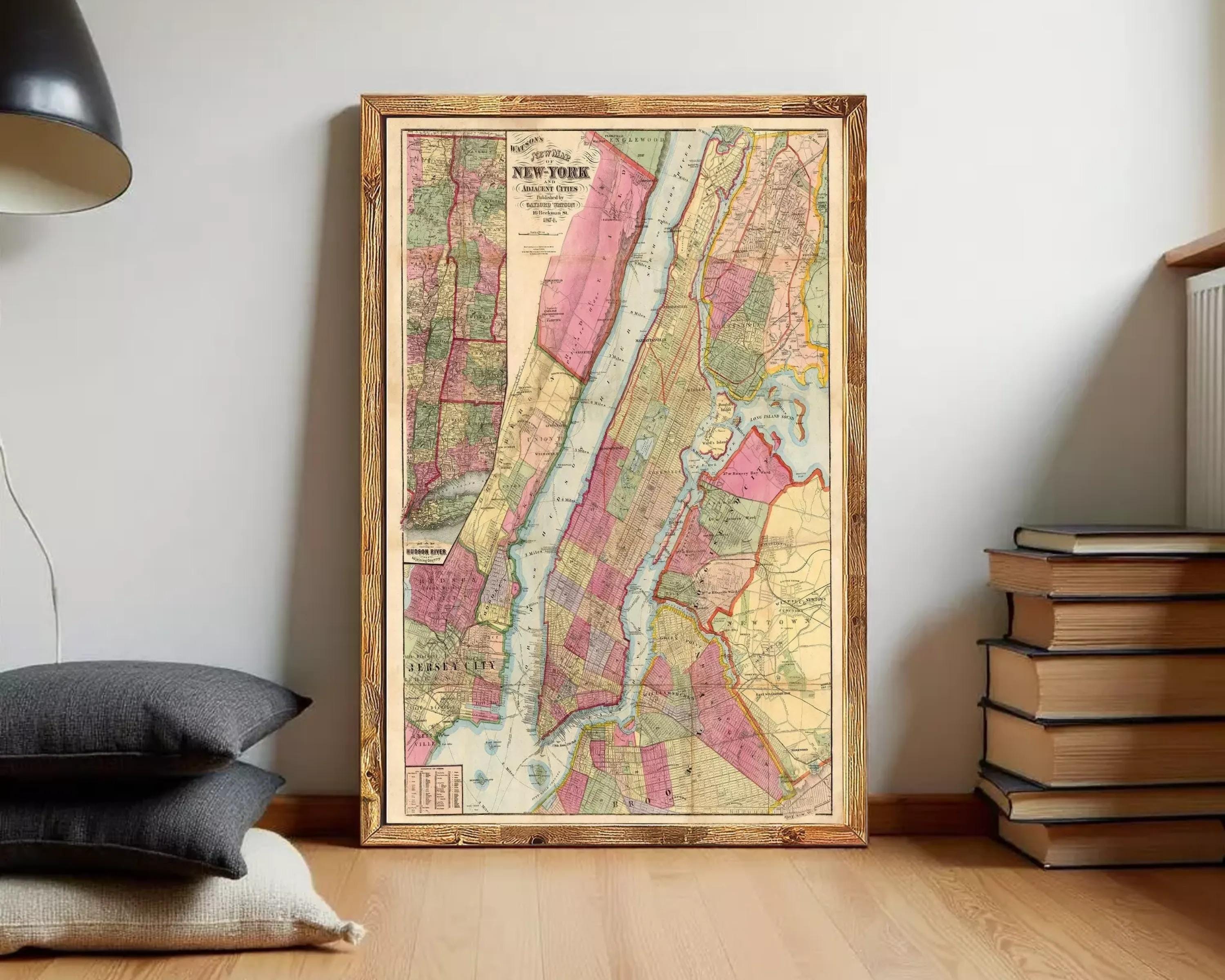 A framed vintage map of New York City, depicting the city's streets, neighborhoods, and surrounding areas.
