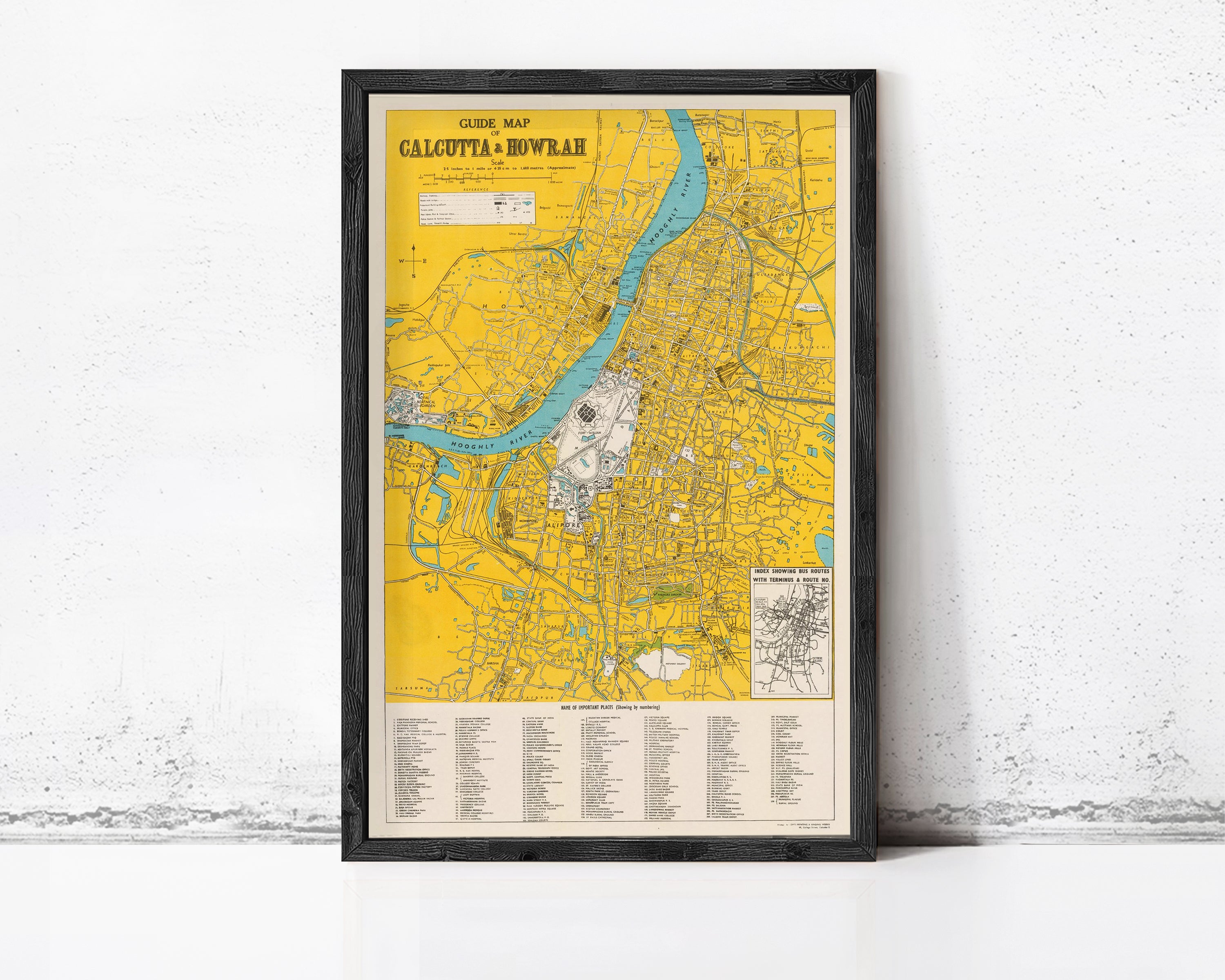 The image is a framed map of Calcutta, India, showing the city's streets, rivers, and other geographical features.