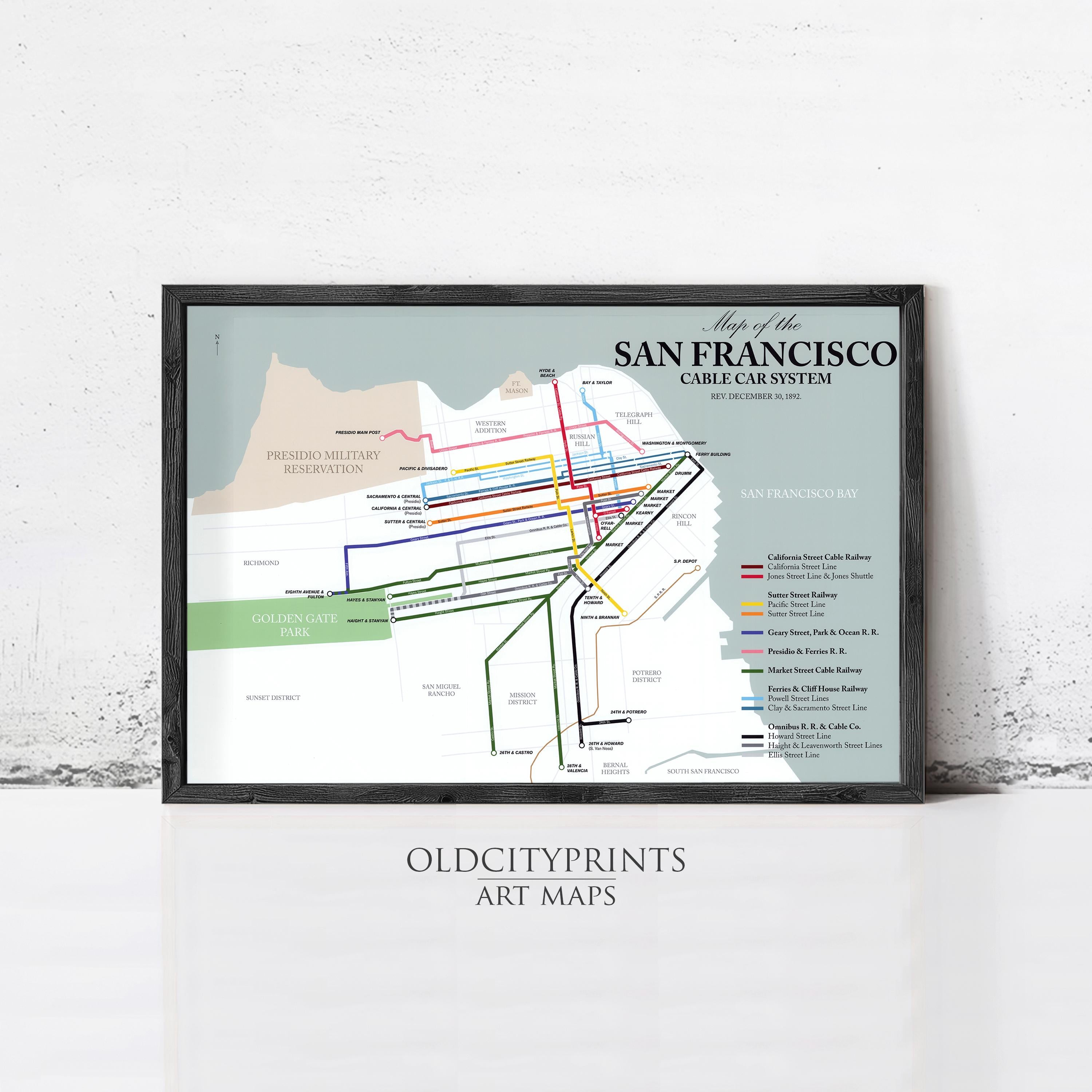 The image is a framed art map of the San Francisco Cable Car System, depicting the extensive network of cable cars and their routes throughout the city.