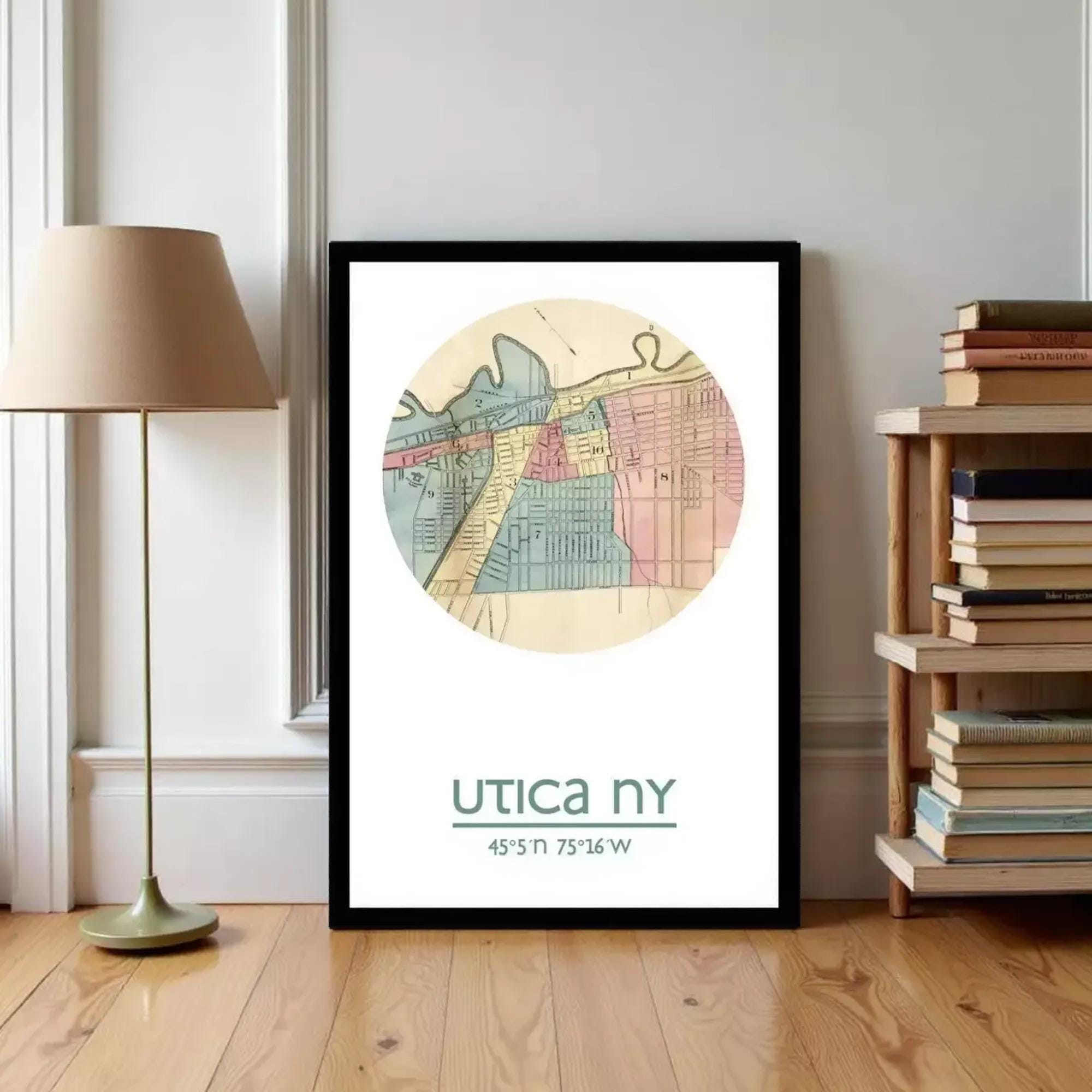 A framed map of Utica, New York, with a lamp and a bookshelf in the background.