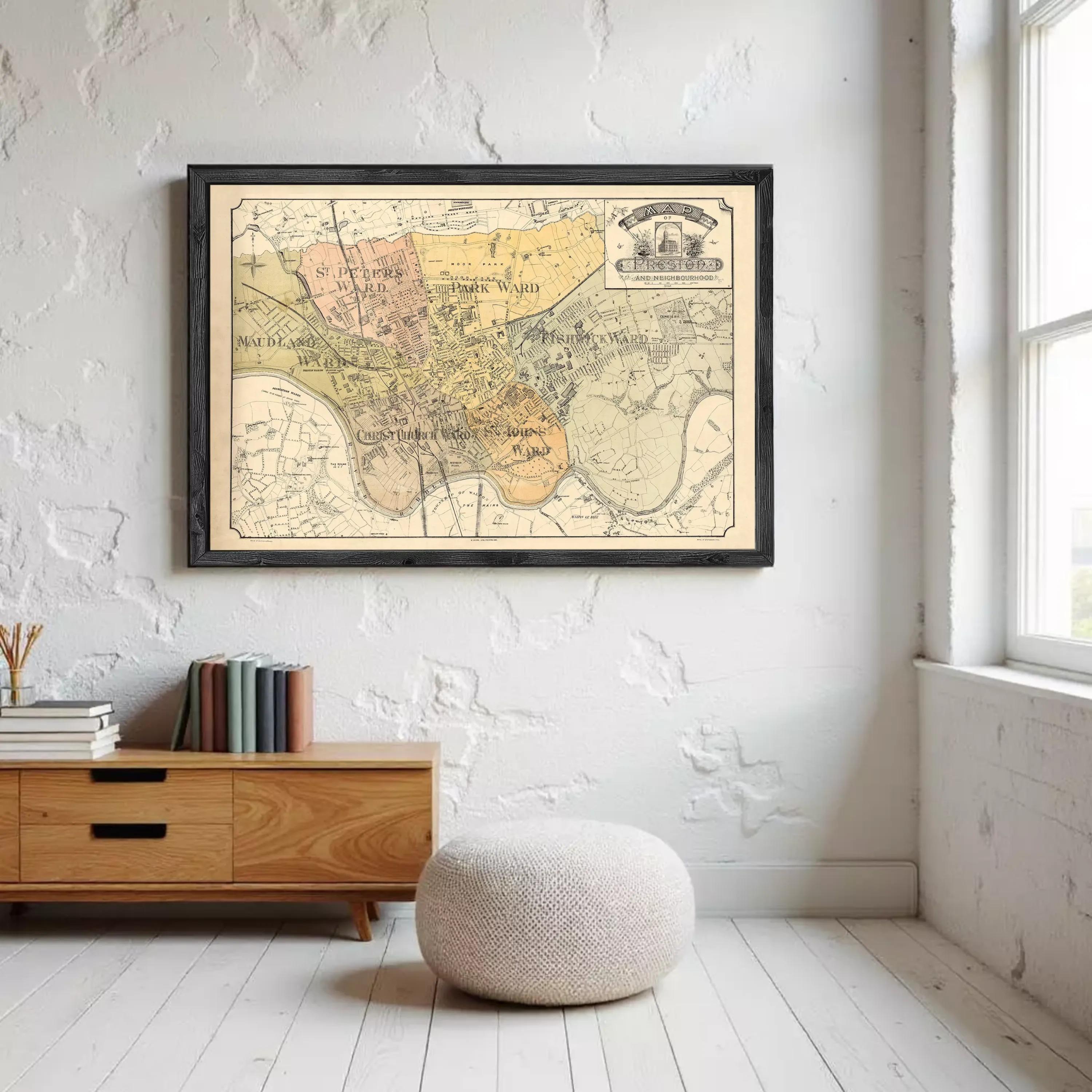 The image is a framed vintage map of a city, depicting various landmarks and streets.