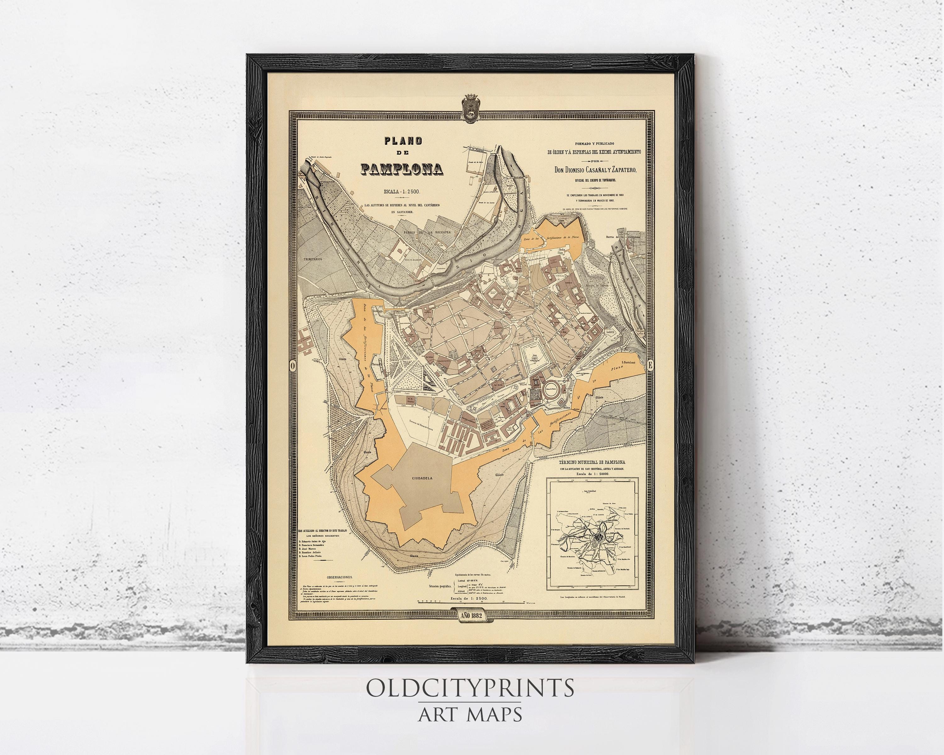 The image is a framed vintage map of Pamplona, Spain, depicting the city's layout and surrounding areas.