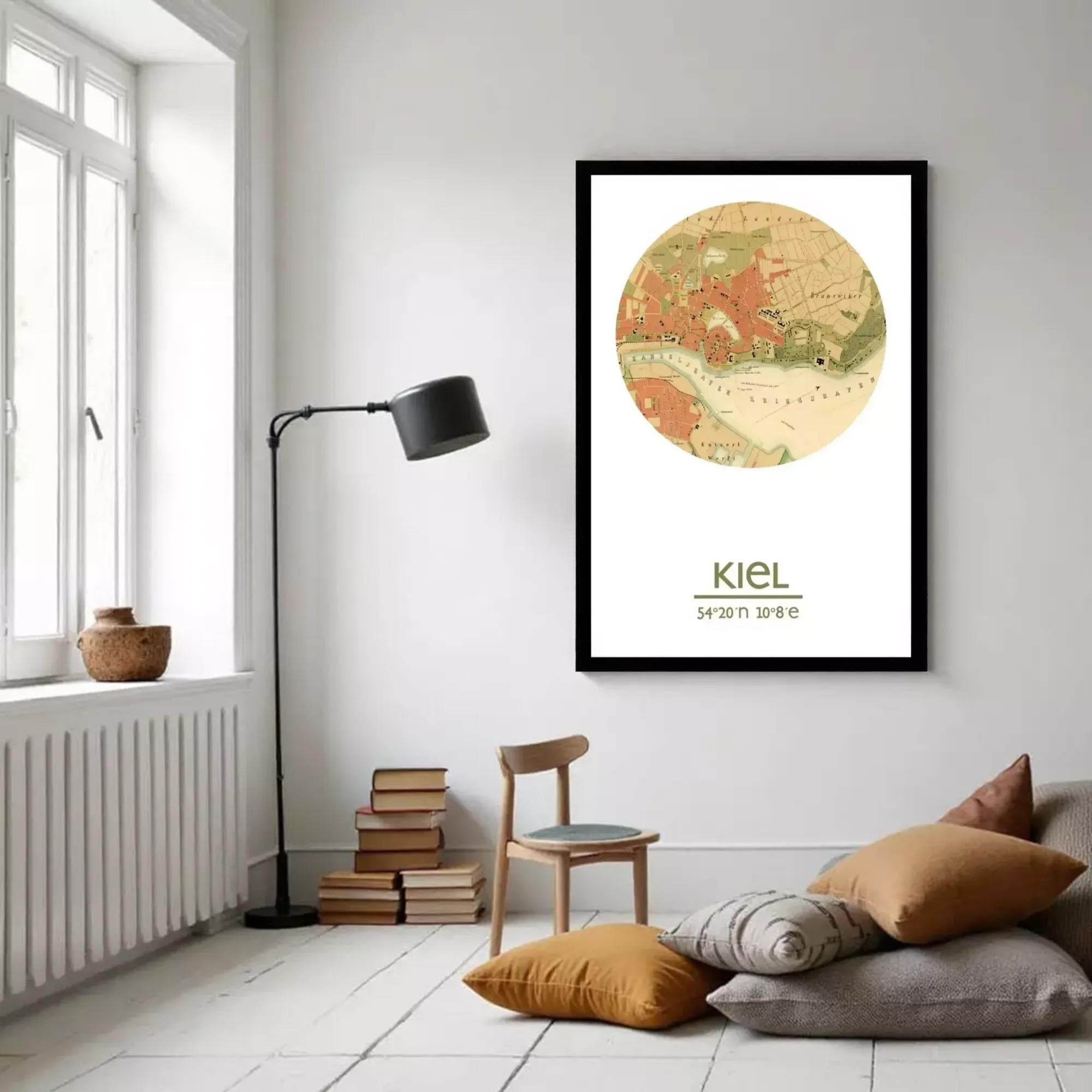 A framed map of Kiel, a city in Germany, with a vintage-style illustration of the city's layout and surrounding areas.