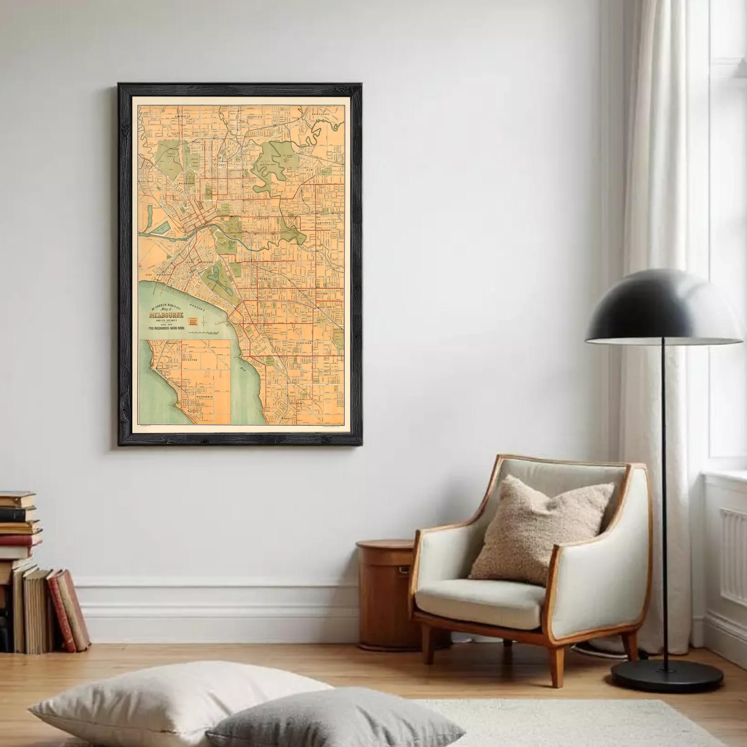 The image is a framed vintage map of Melbourne, Australia, depicting the city's streets and surrounding areas.