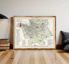 The image is a framed vintage map of the city of Rome, Italy, depicting the layout and various landmarks of the city.