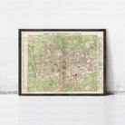 The image is a framed vintage map of London, England, showing the city's layout and surrounding areas.
