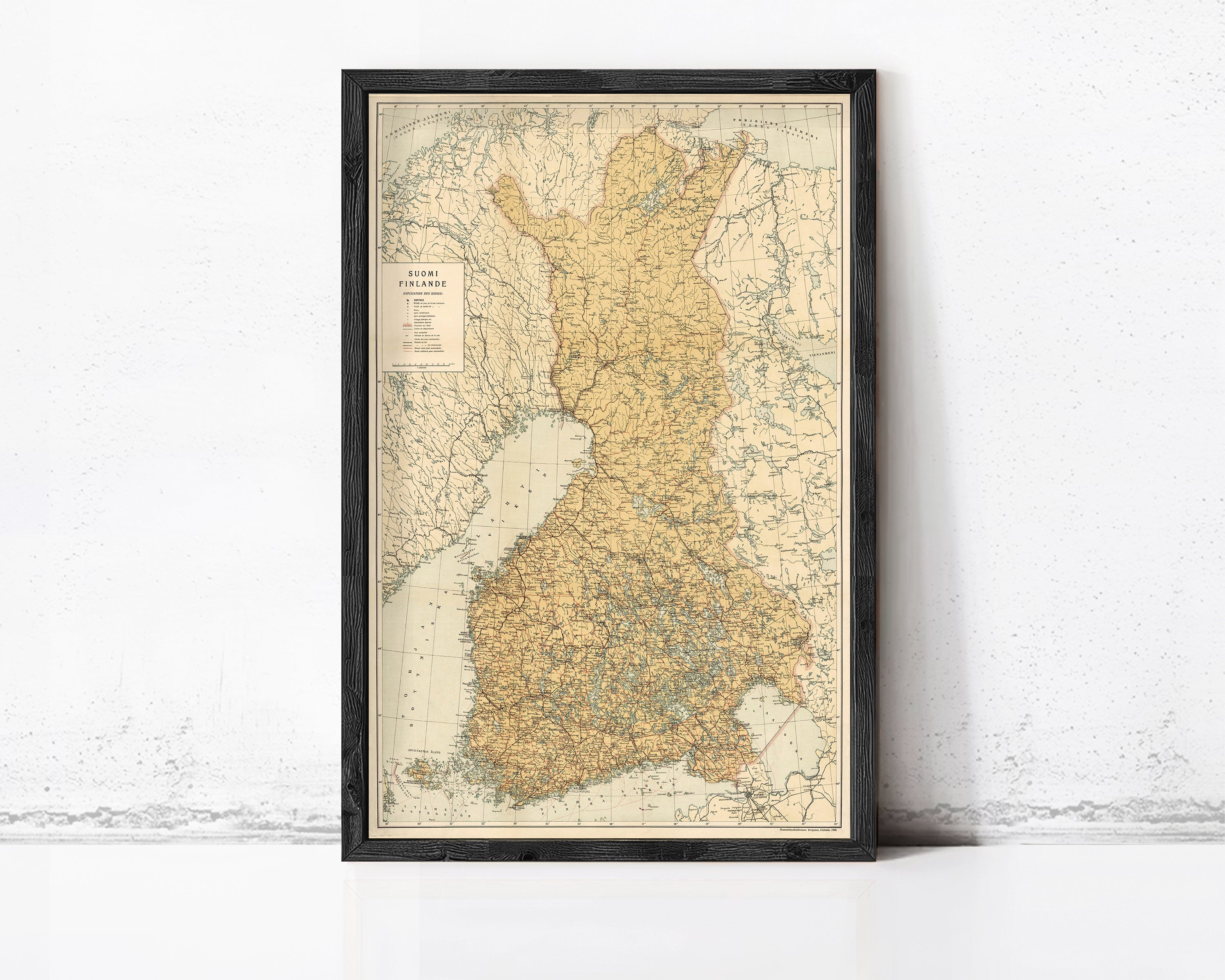 The image is a framed map of Finland, showing the country's geographical layout and surrounding areas.