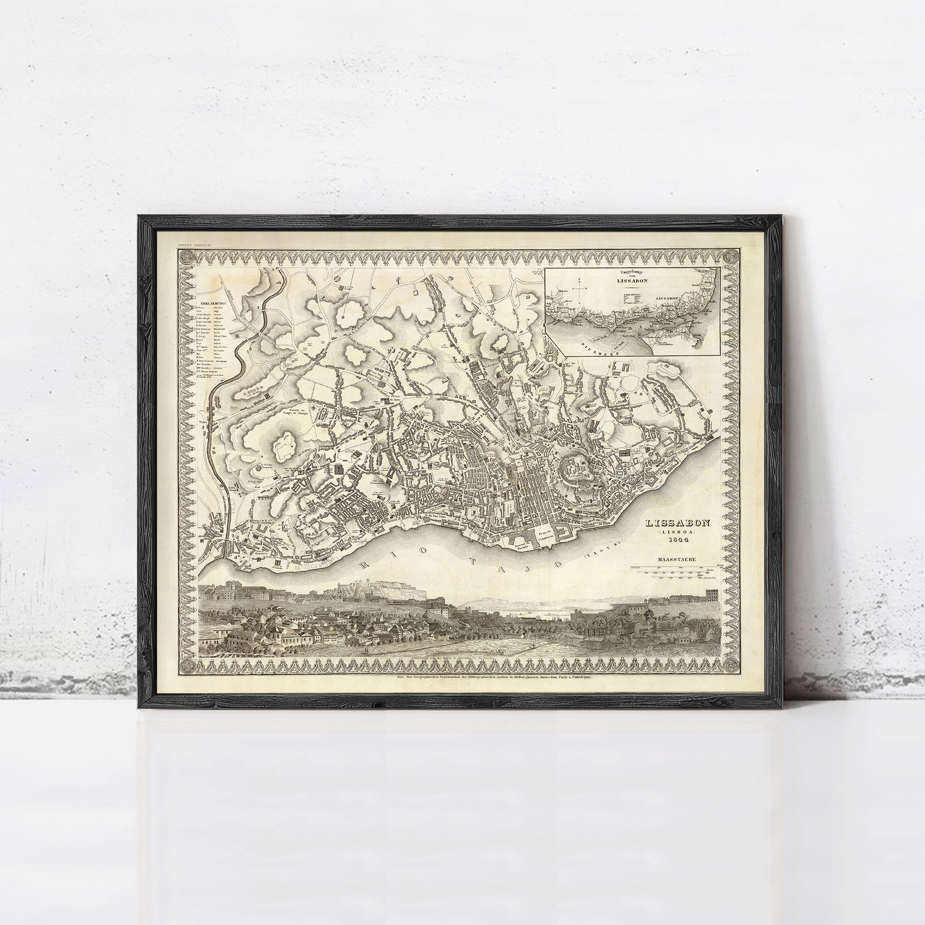 The image is a framed antique map of London, England, dating back to the 18th century.
