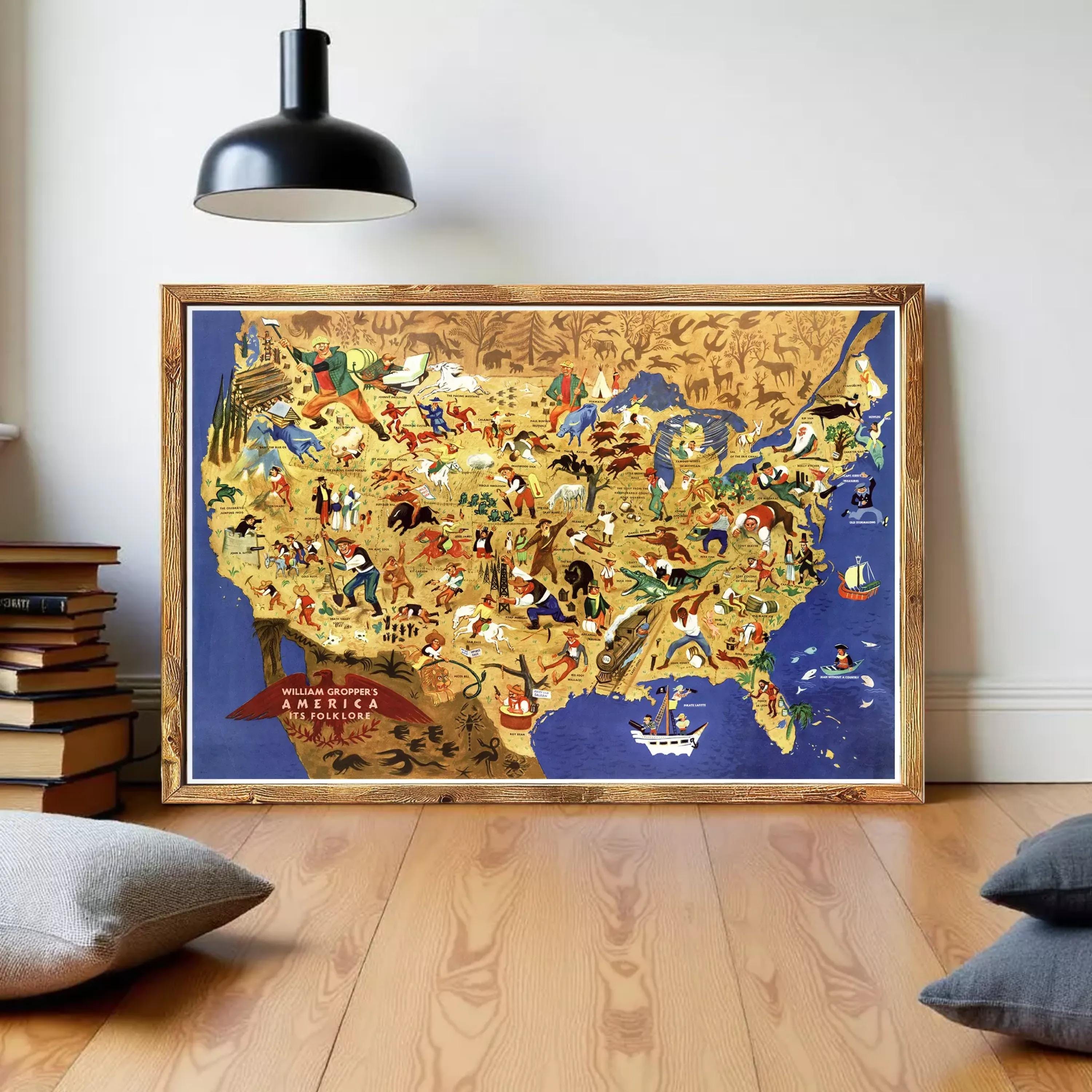 The image is a framed illustration of a colorful map of the United States, depicting various landmarks, people, and animals across the country.