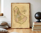 The image is a framed vintage map of Barbados, showing the country's geographical layout and boundaries.