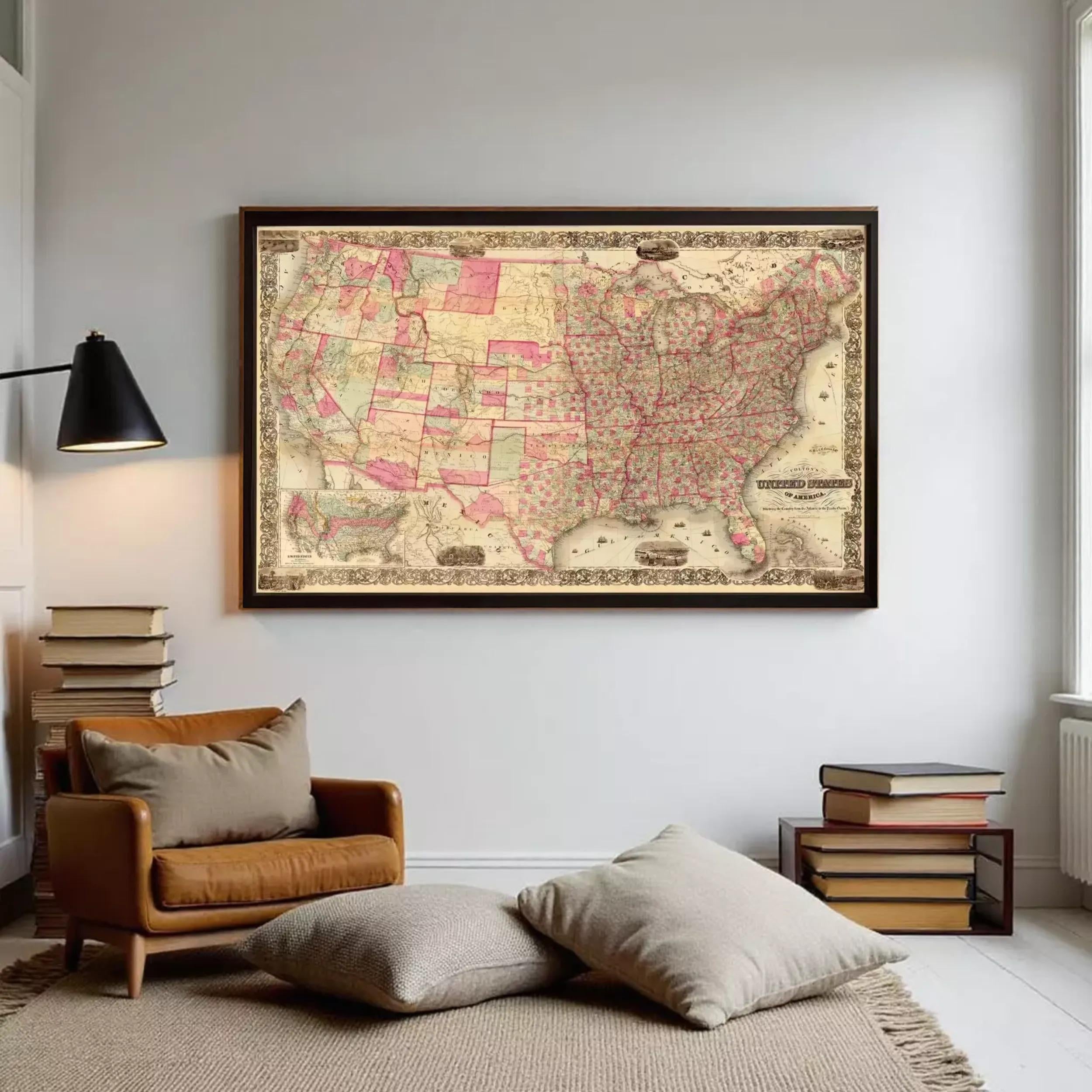 a large framed map of the United States hanging on a wall in a living room.