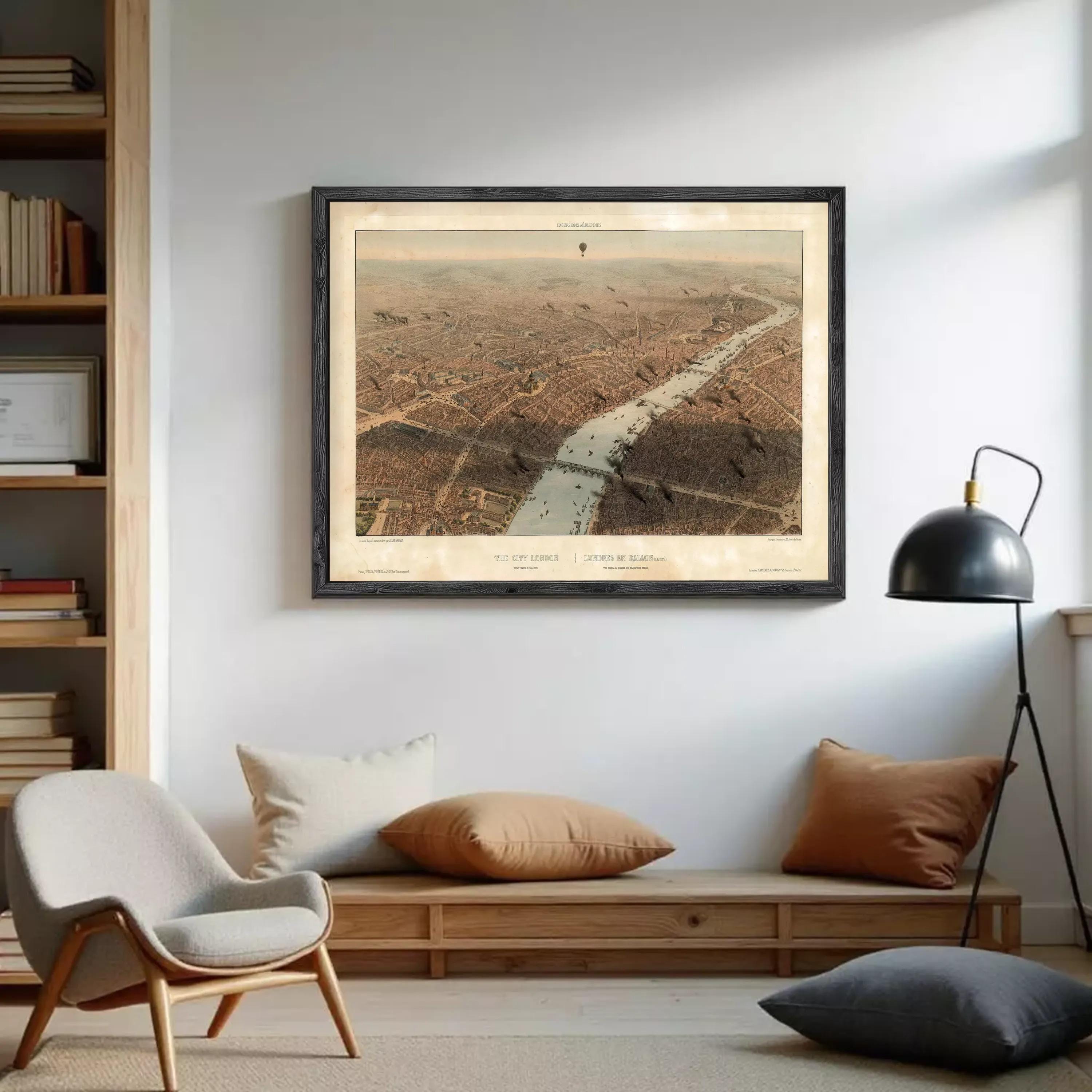 The image is a framed aerial view of a city, depicting a river or canal running through the center of the city.
