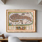 a large, colorful map of Venice hanging on a wall above a wooden desk.