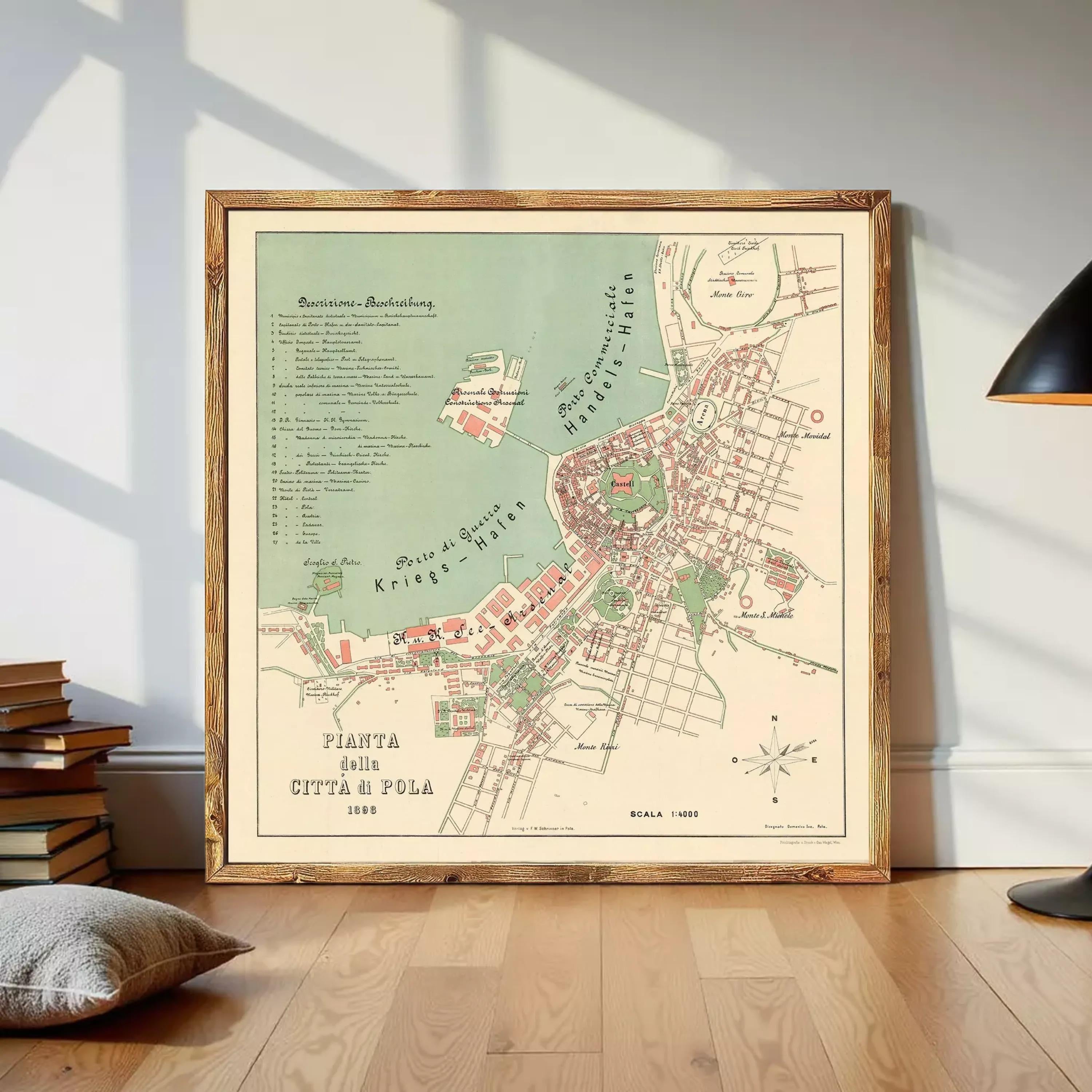 The image is a framed map of a city, likely a historical or vintage map, with various landmarks and streets labeled.