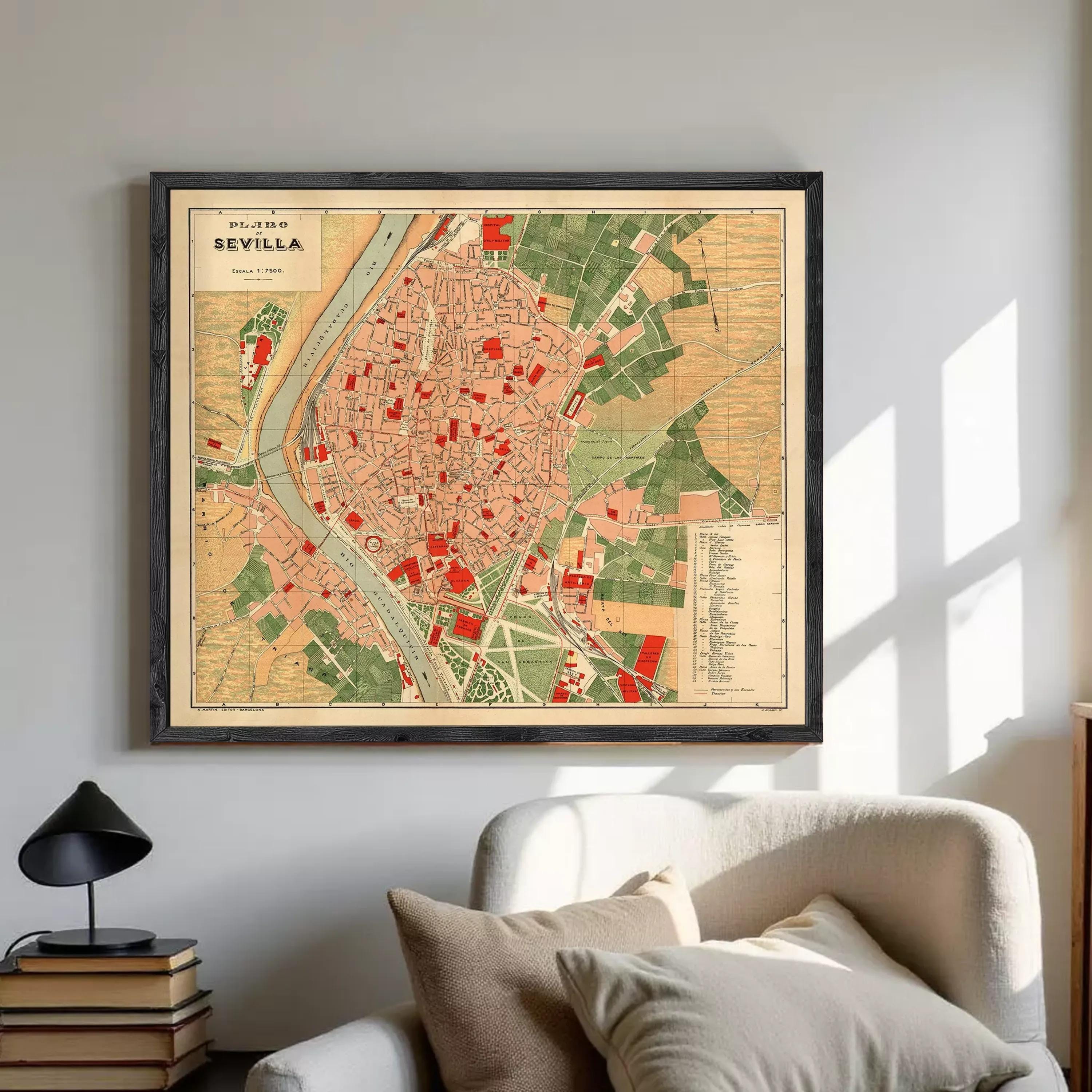 The image is a framed vintage map of the city of Seville, Spain, depicting the city's layout and surrounding areas.
