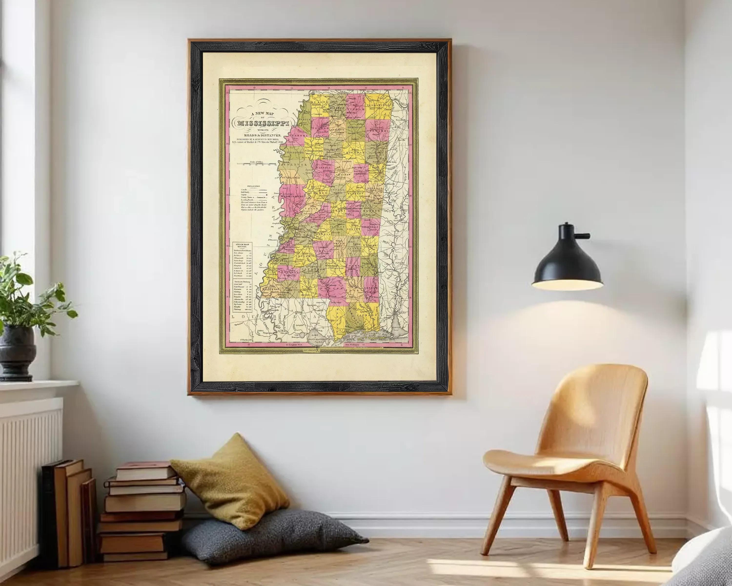 A framed map of the state of Mississippi, with the state's borders clearly marked and the names of the cities and towns within the state.