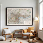 A framed map of Shanghai, China, with a river and various landmarks visible.