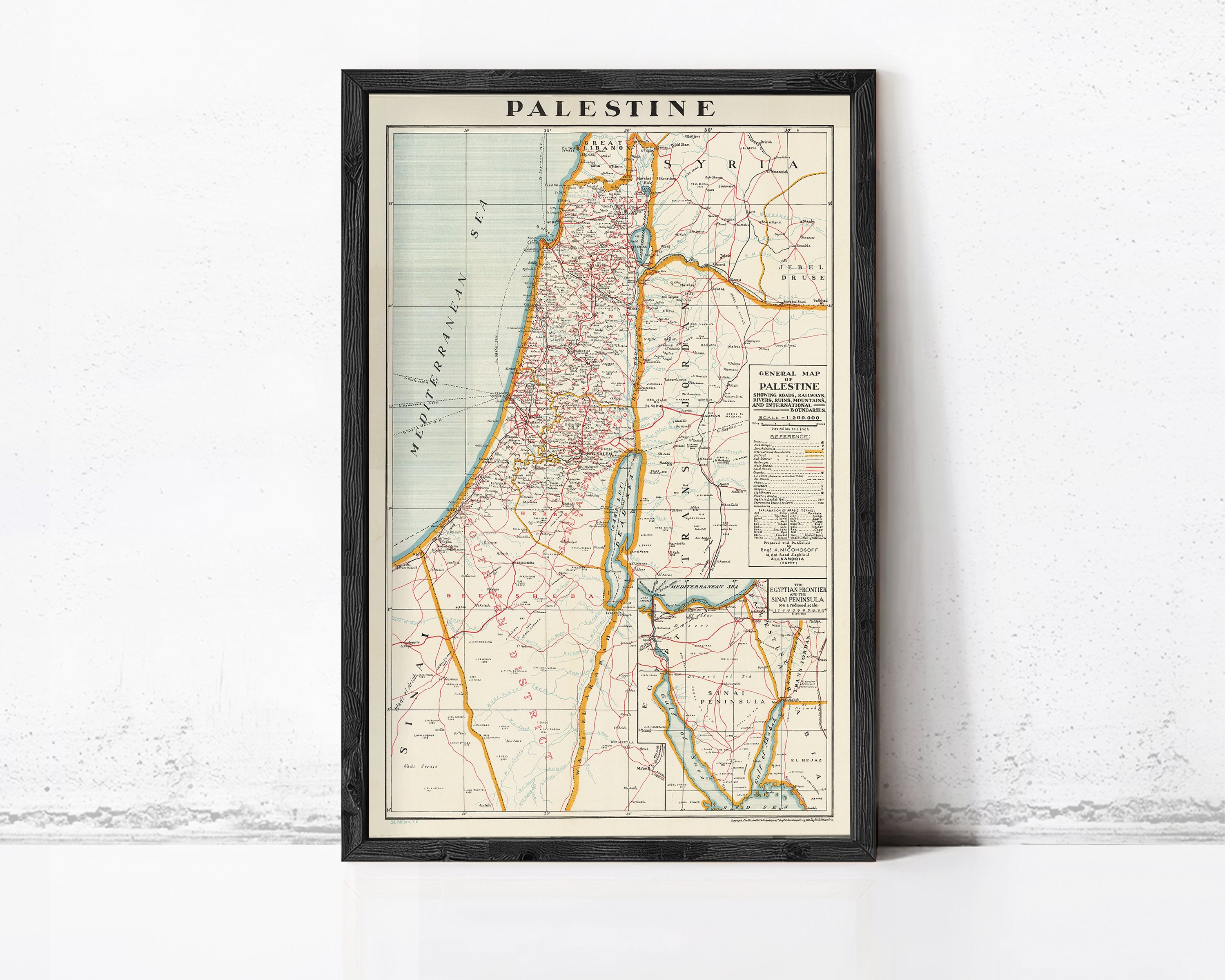 The image is a framed vintage map of Palestine, depicting the country's geographical layout and boundaries.