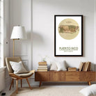 A framed map of Puerto Rico, with the text "PUERTO RICO" and the location "18° 27' 66" W" printed on it.
