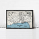 The image is a framed map of Toronto, Canada, depicting the city's streets and surrounding areas.