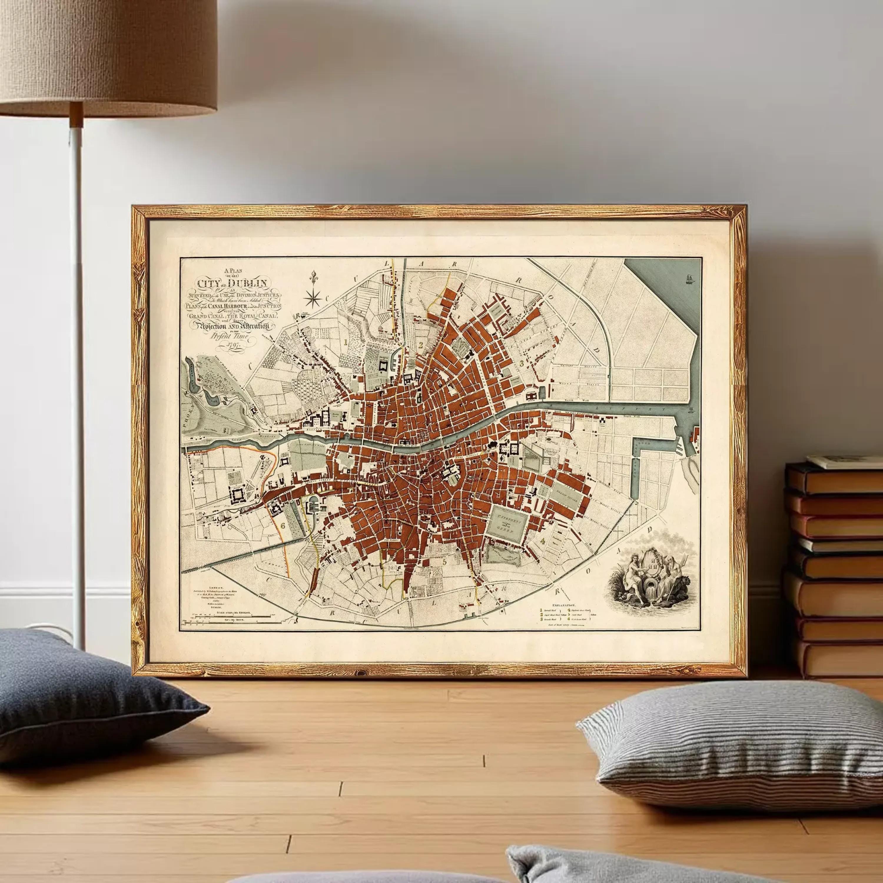 The image is a framed map of a city, likely London, with a detailed layout of streets, landmarks, and other urban features.