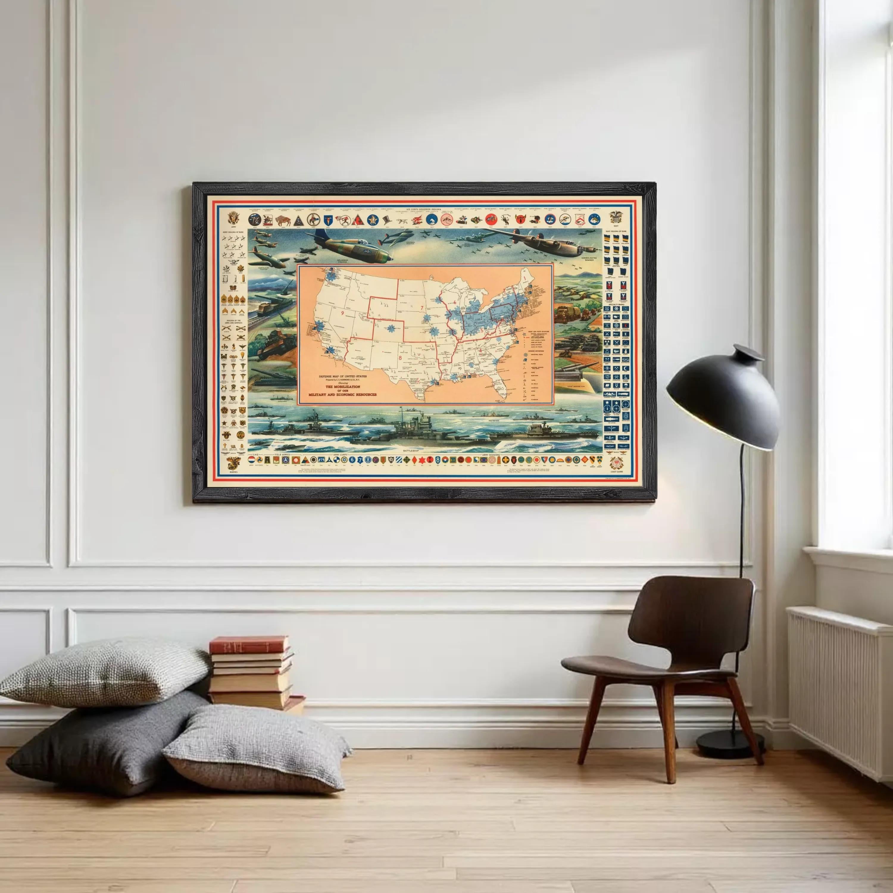 The image is a framed vintage map of the United States, depicting various military and economic symbols and locations.