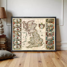 The image is a framed vintage map of the United Kingdom, featuring intricate illustrations and detailed cartography.